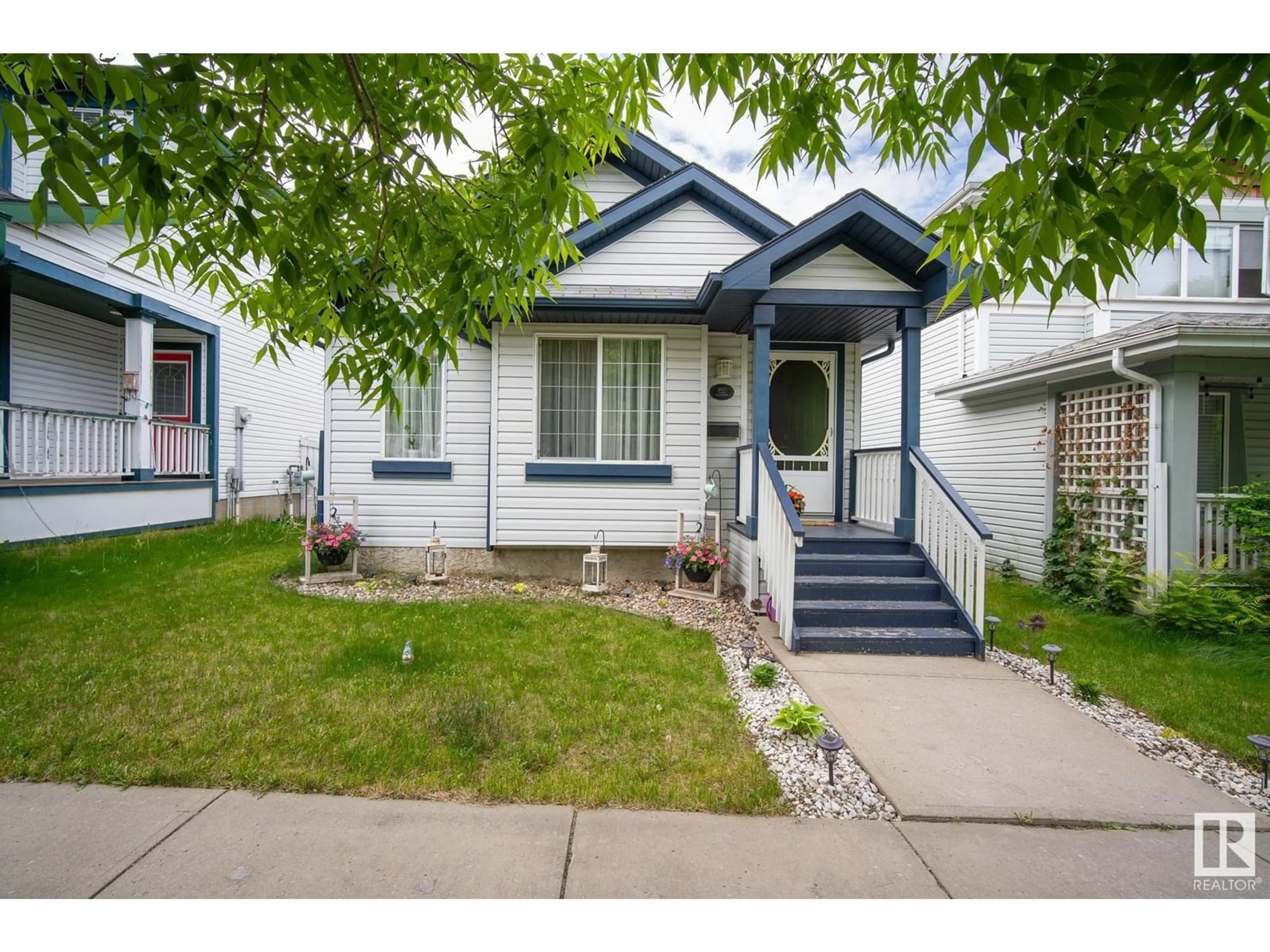 Home with vinyl exterior material, street for 3021 TRELLE CR, Edmonton Alberta T6R3M8