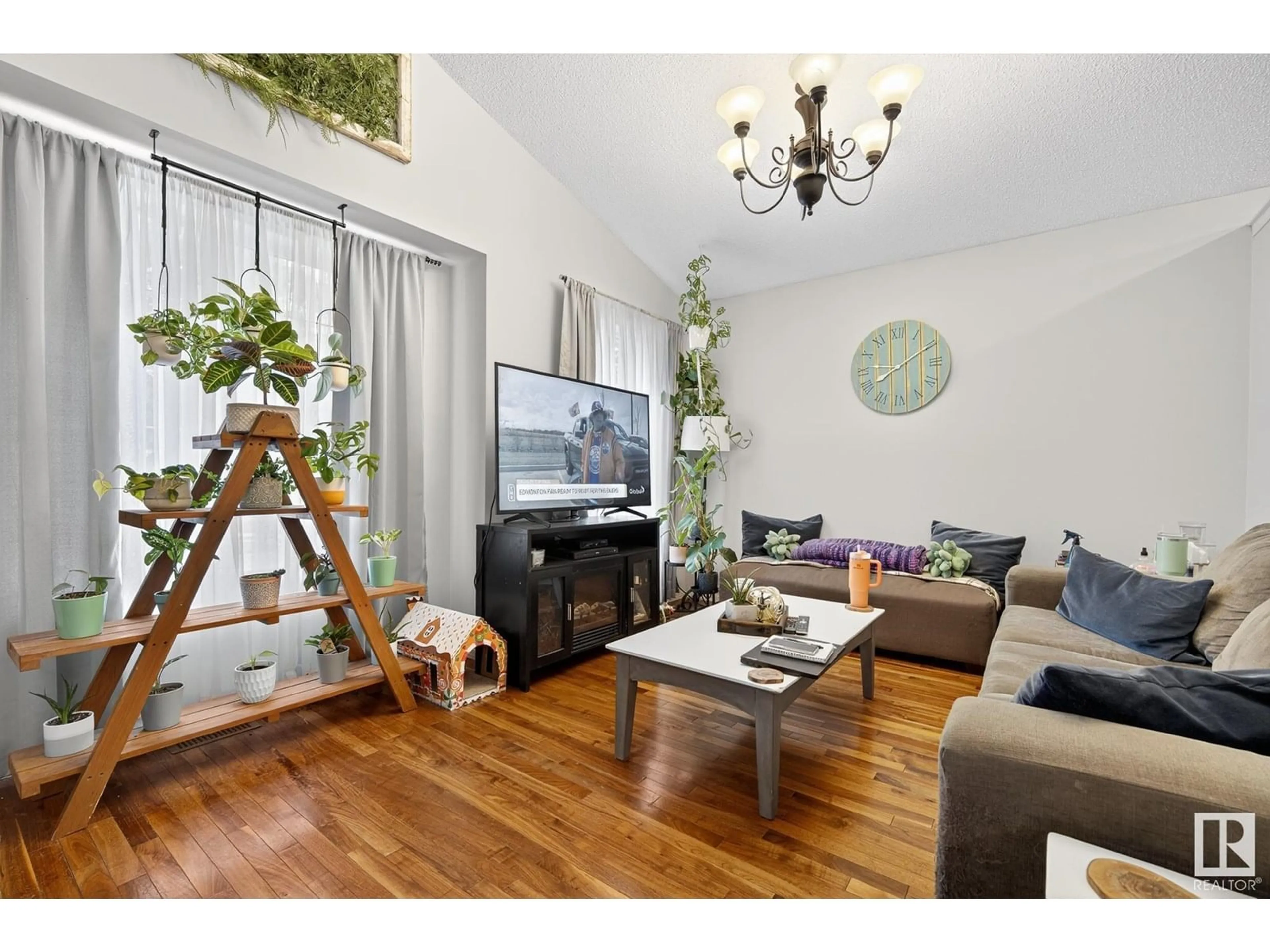 Living room with furniture, wood/laminate floor for 3021 TRELLE CR, Edmonton Alberta T6R3M8