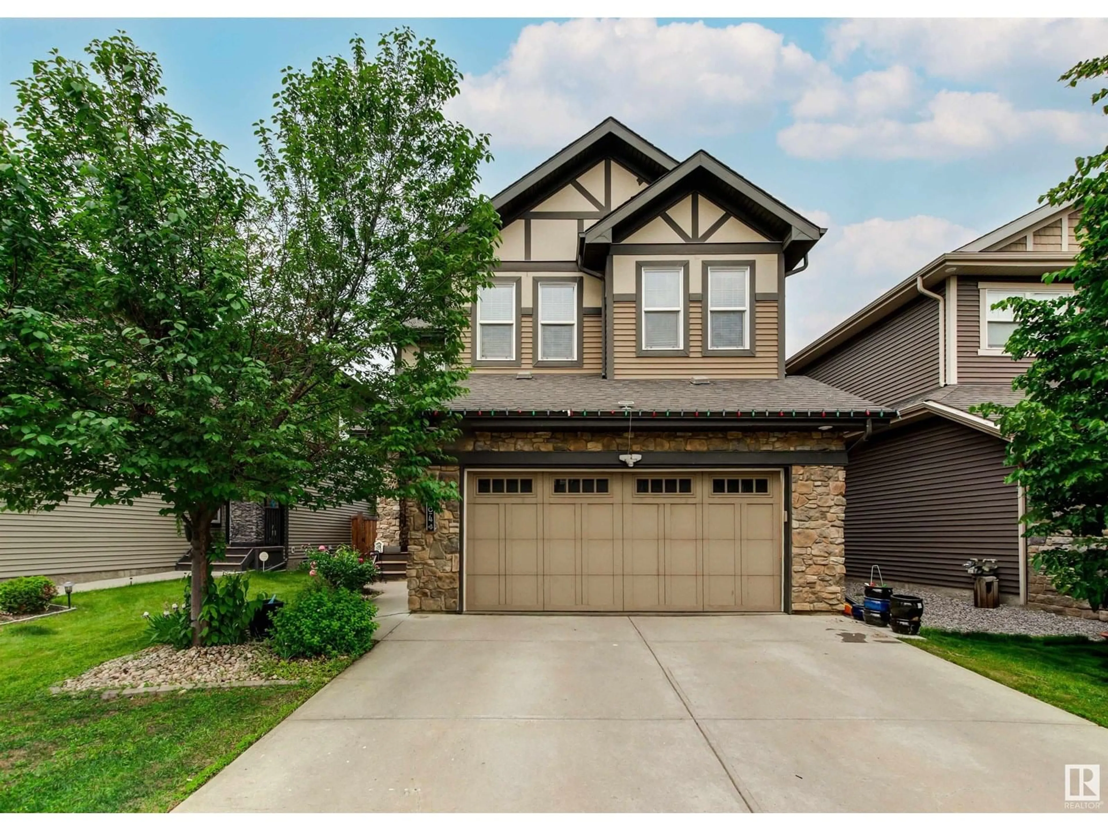 Home with brick exterior material, street for NW - 8804 217 ST, Edmonton Alberta T5T4R4