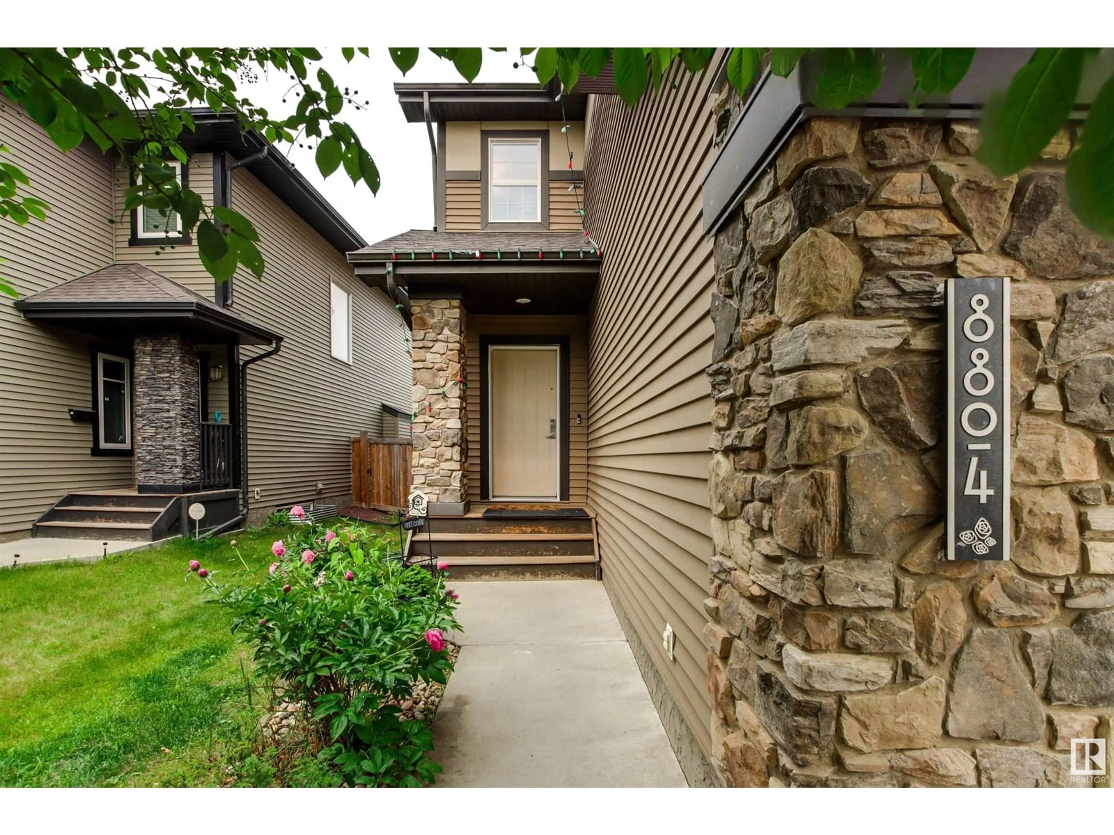 Home with brick exterior material, street for NW - 8804 217 ST, Edmonton Alberta T5T4R4