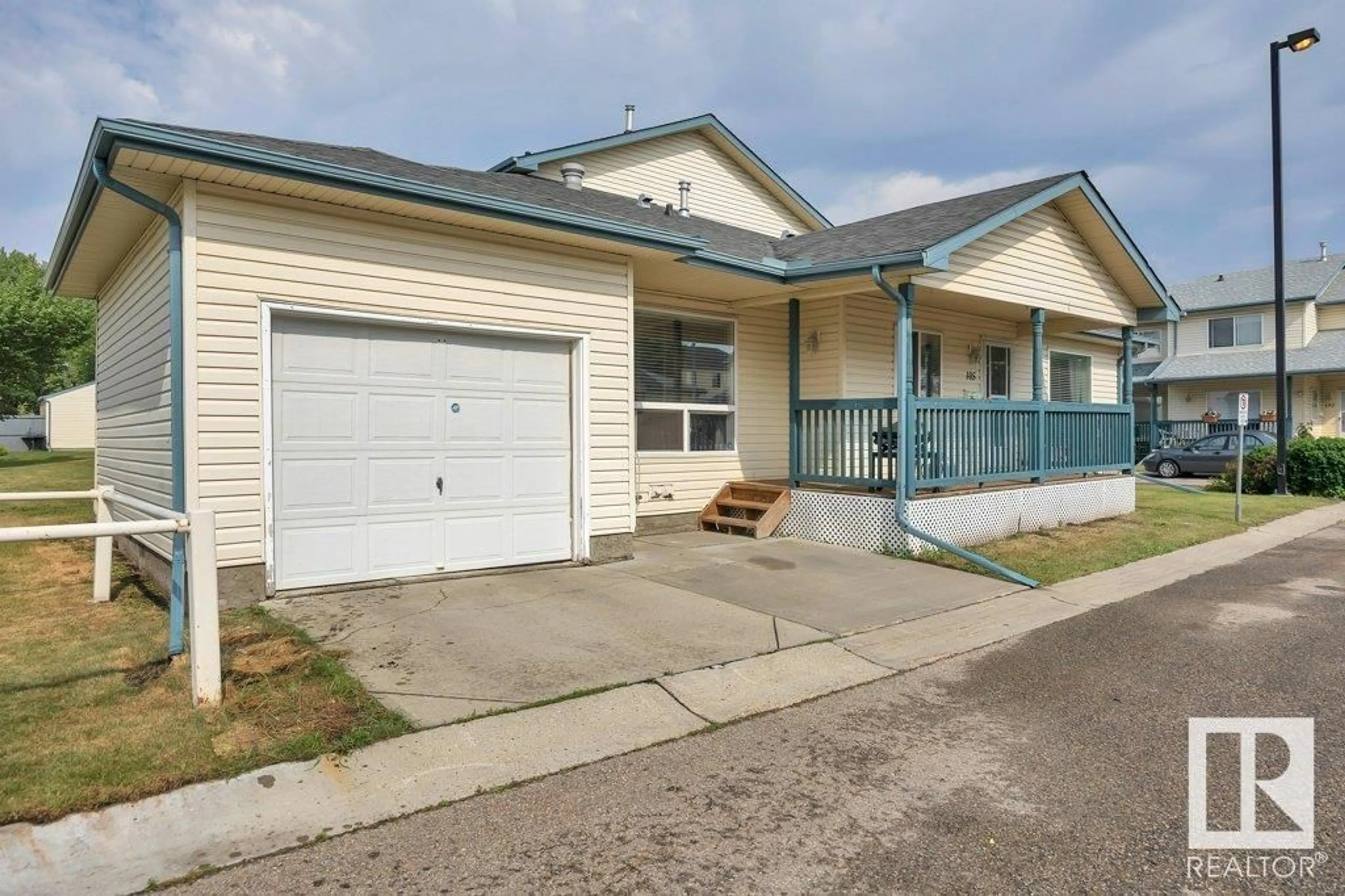 Home with vinyl exterior material, street for 10909 106 ST, Edmonton Alberta T5H4M7