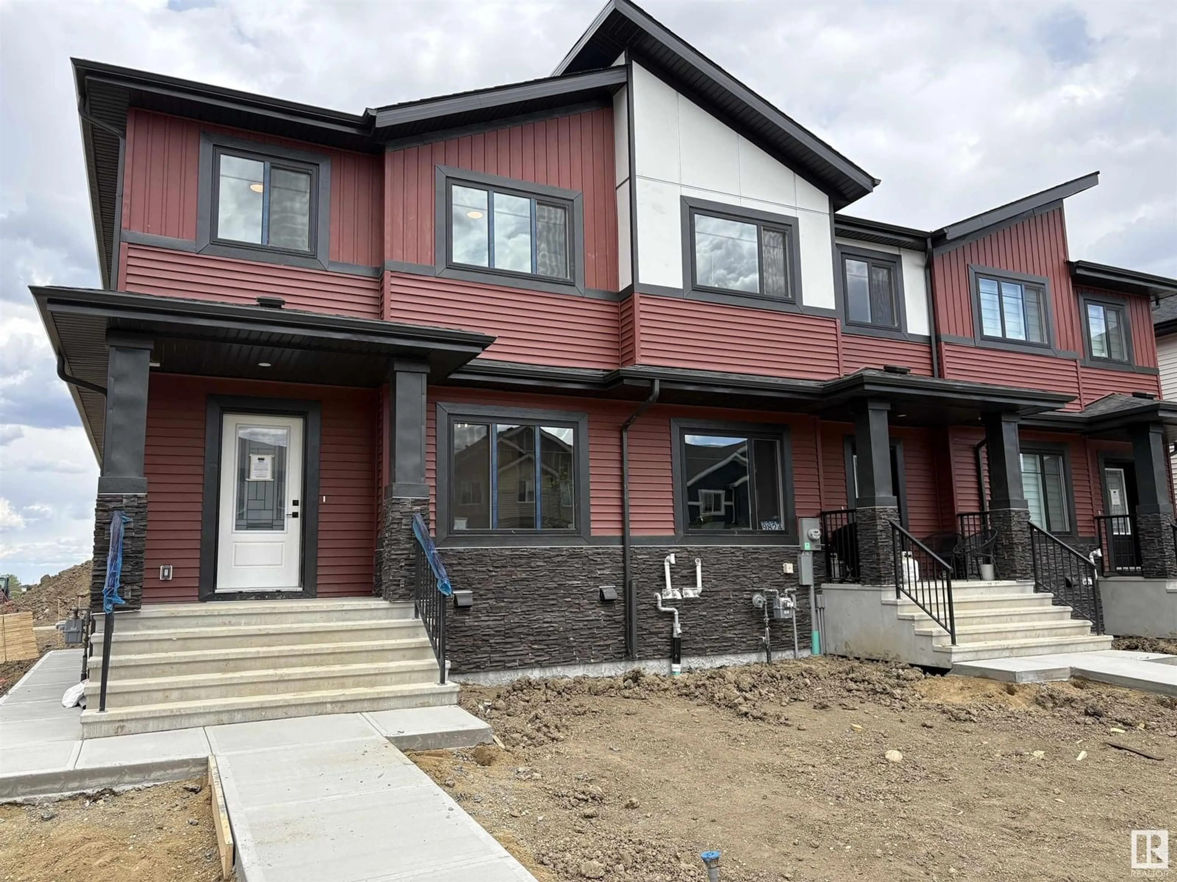 Home with brick exterior material, street for 9907 107 AV, Morinville Alberta T8R2P1