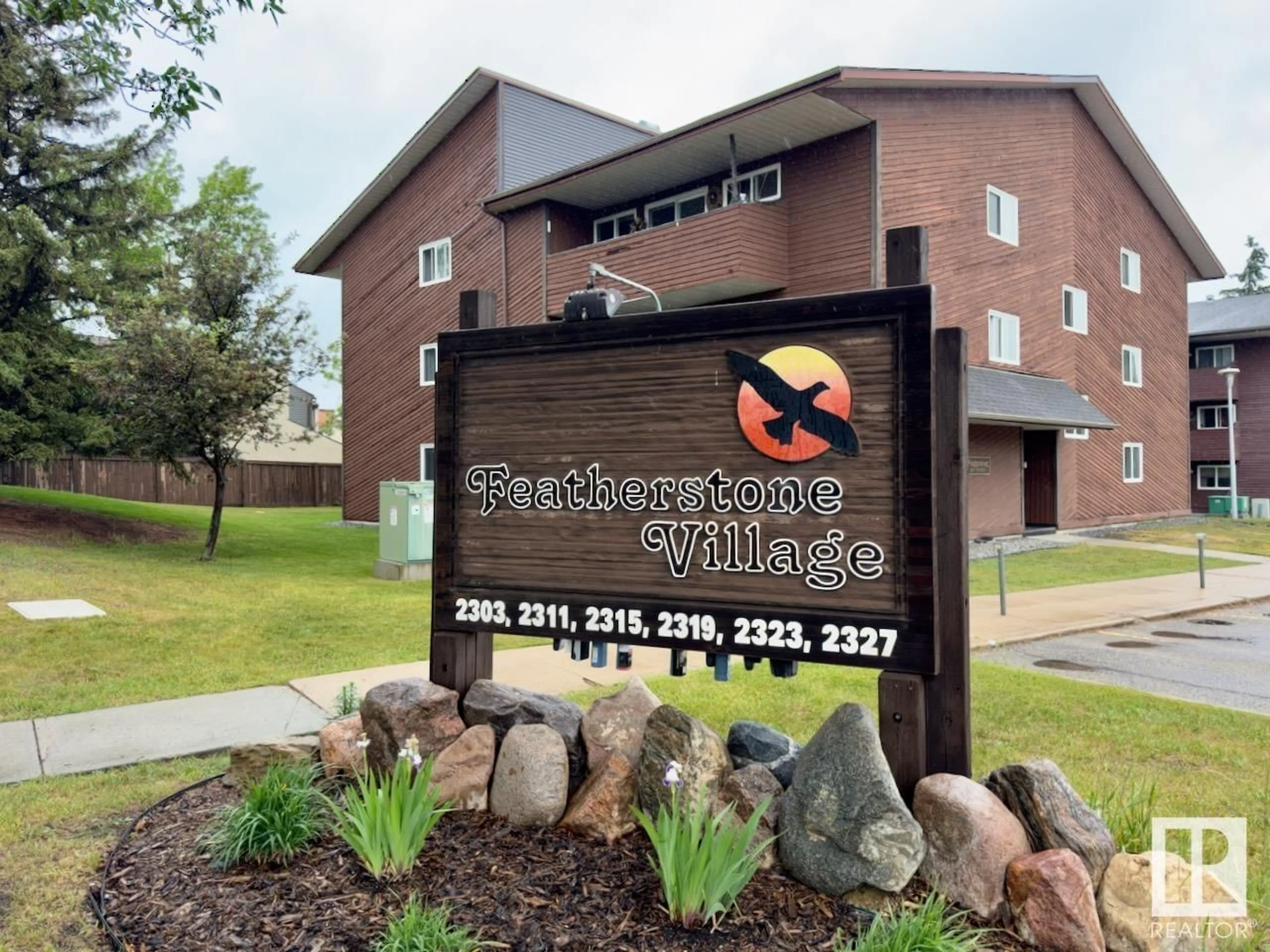 Home with brick exterior material, building for #323 - 2327 119 ST NW, Edmonton Alberta T6J4E2