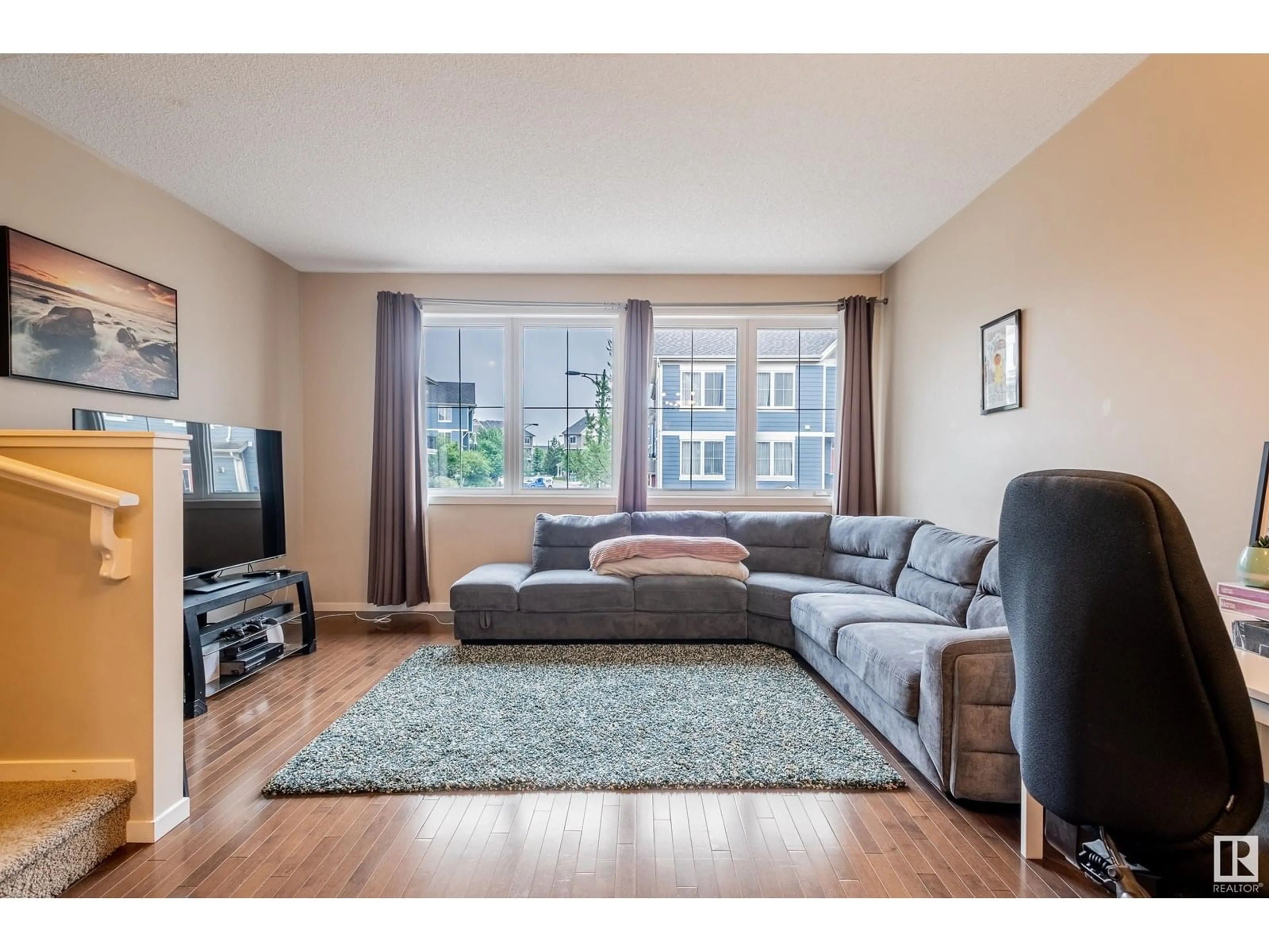 Living room with furniture, unknown for #25 - 603 WATT BV, Edmonton Alberta T6X0P3