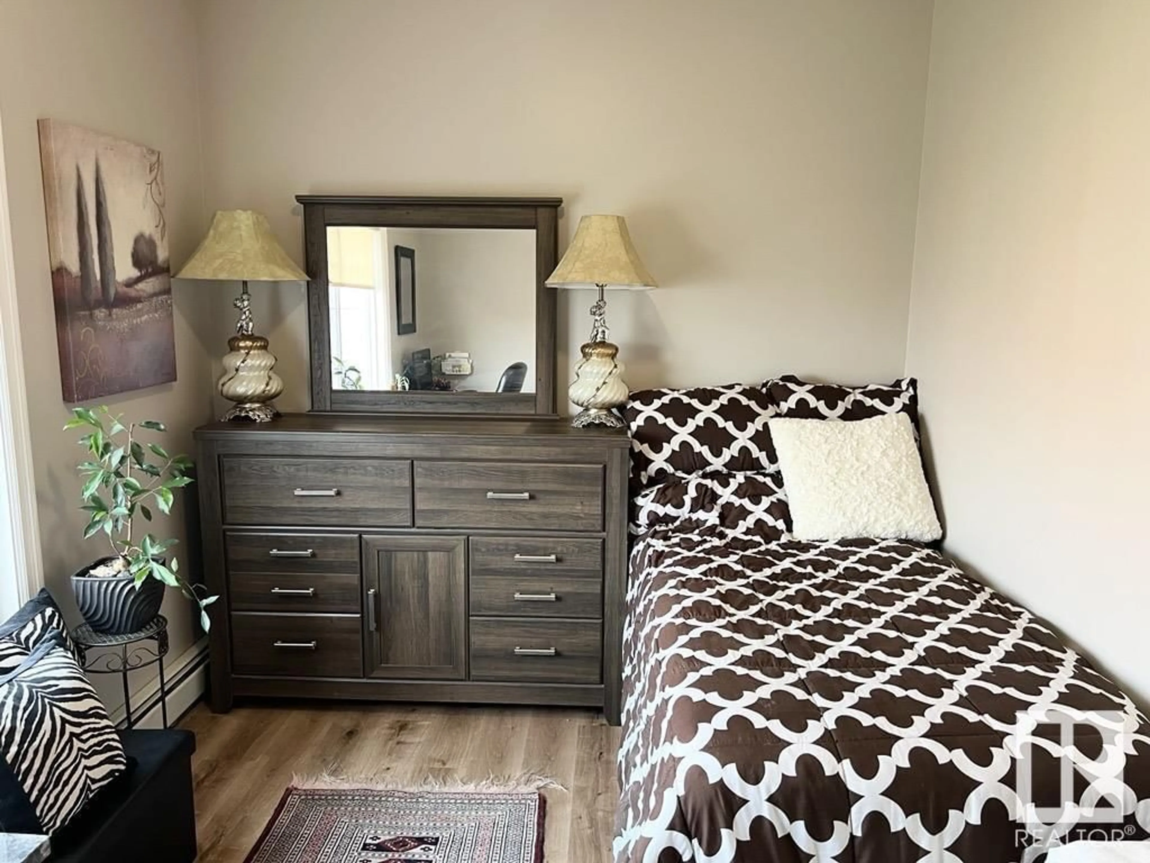 Bedroom with bed, wood/laminate floor for #417 - 263 MACEWAN RD, Edmonton Alberta T6W0C4
