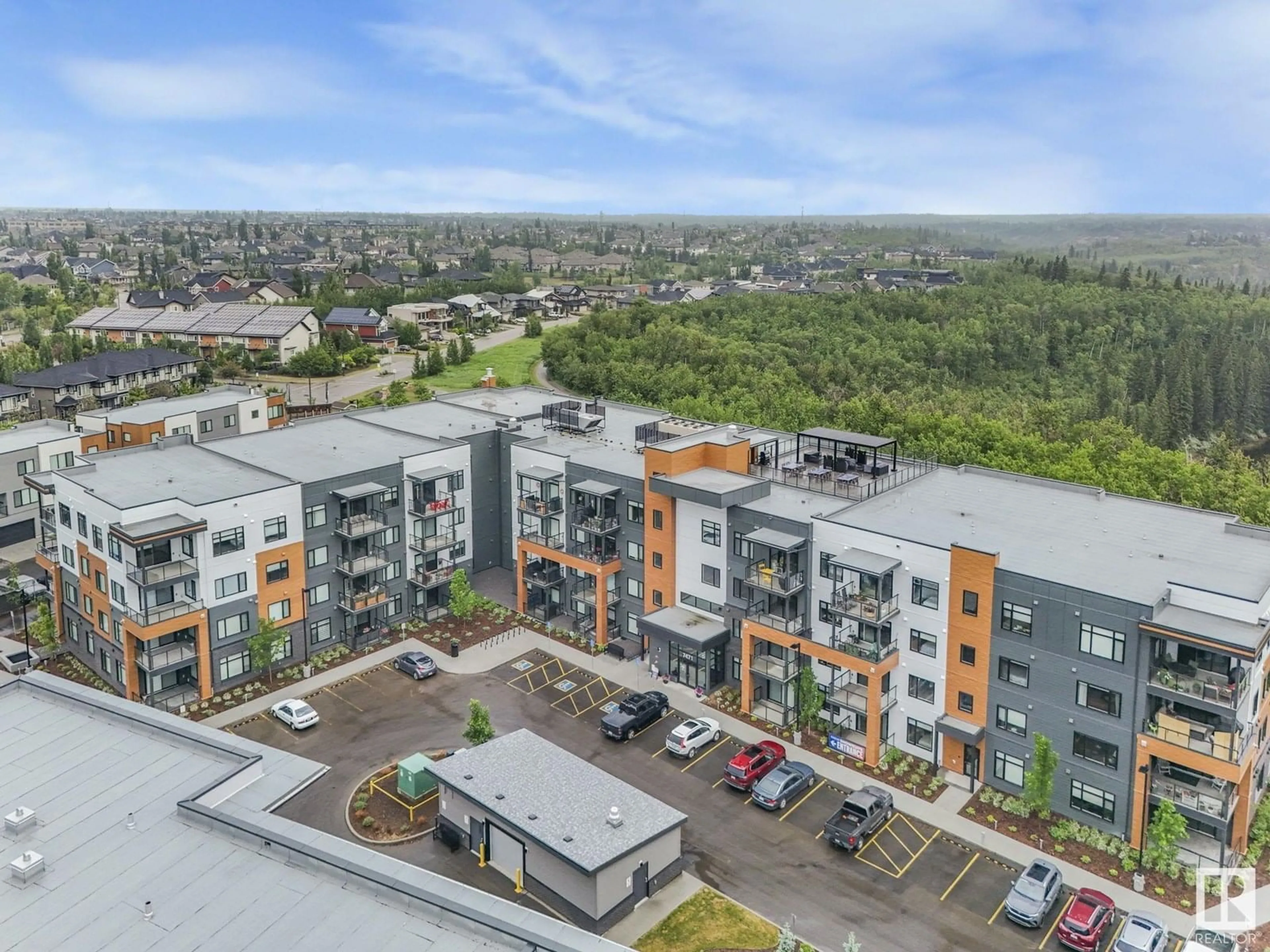A pic from outside/outdoor area/front of a property/back of a property/a pic from drone, city buildings view from balcony for #114 - 7471 MAY COMMON, Edmonton Alberta T6R0X5