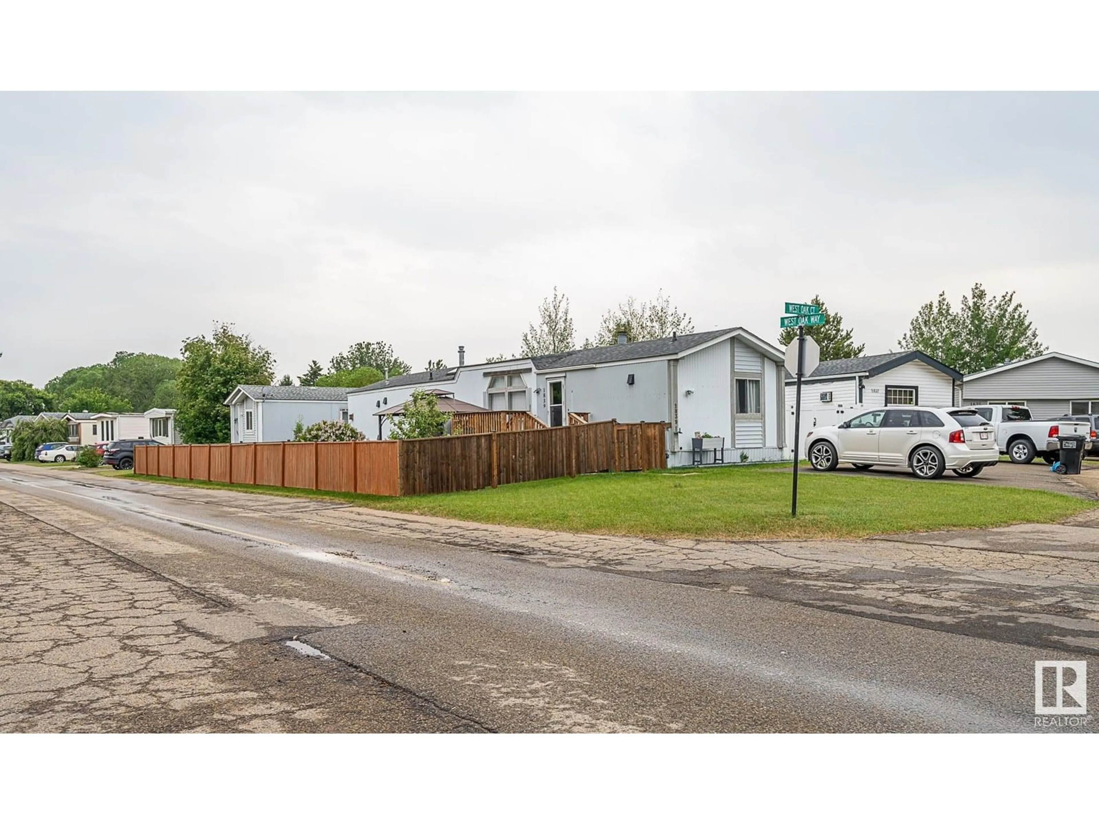 A pic from outside/outdoor area/front of a property/back of a property/a pic from drone, street for NW - 1839 OAK CO, Edmonton Alberta T5S1T5