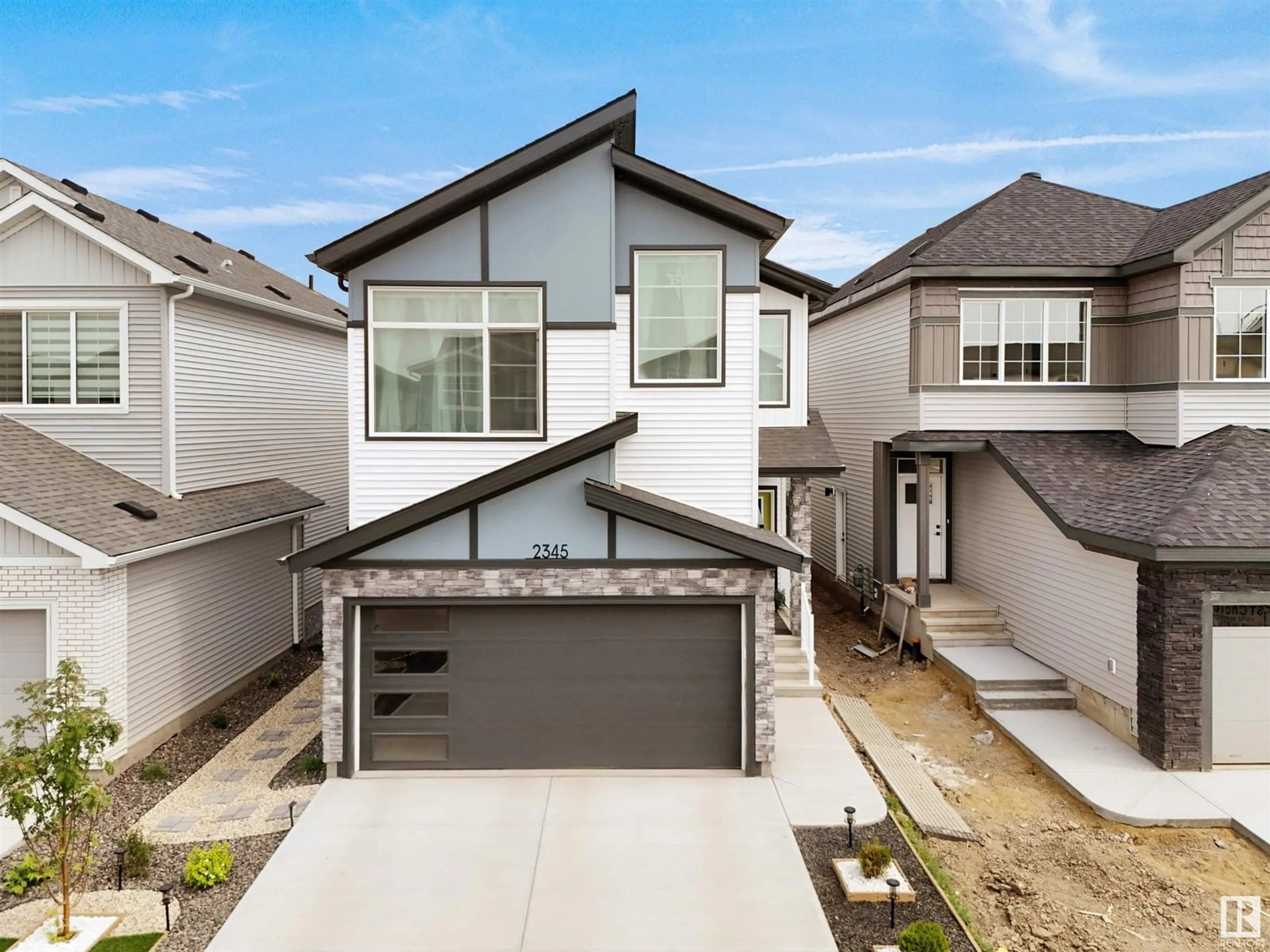 Home with vinyl exterior material, street for SW - 2345 158A ST, Edmonton Alberta T6W5K4