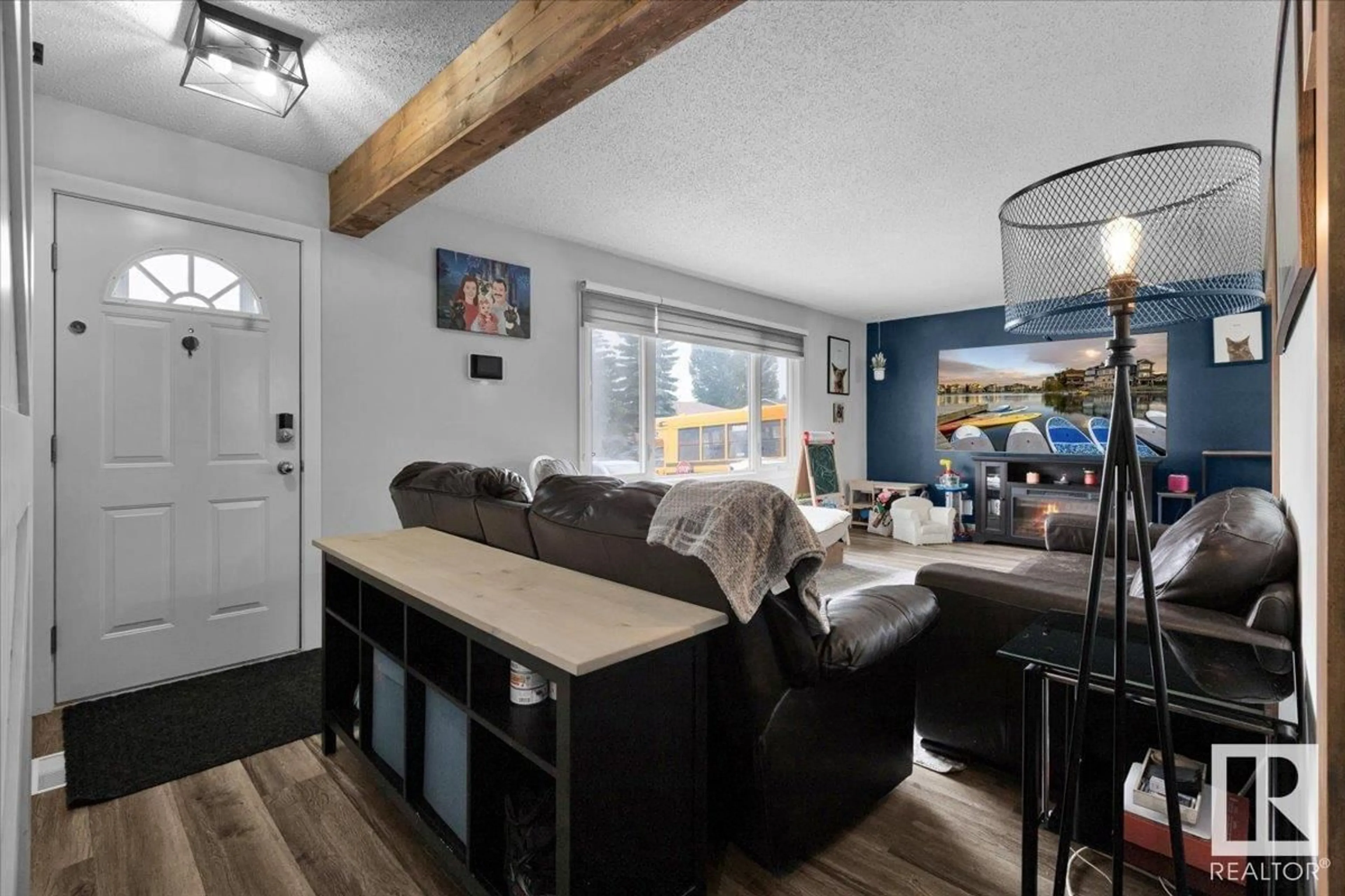 Living room with furniture, wood/laminate floor for 4524 47 ST, Gibbons Alberta T0A1N0