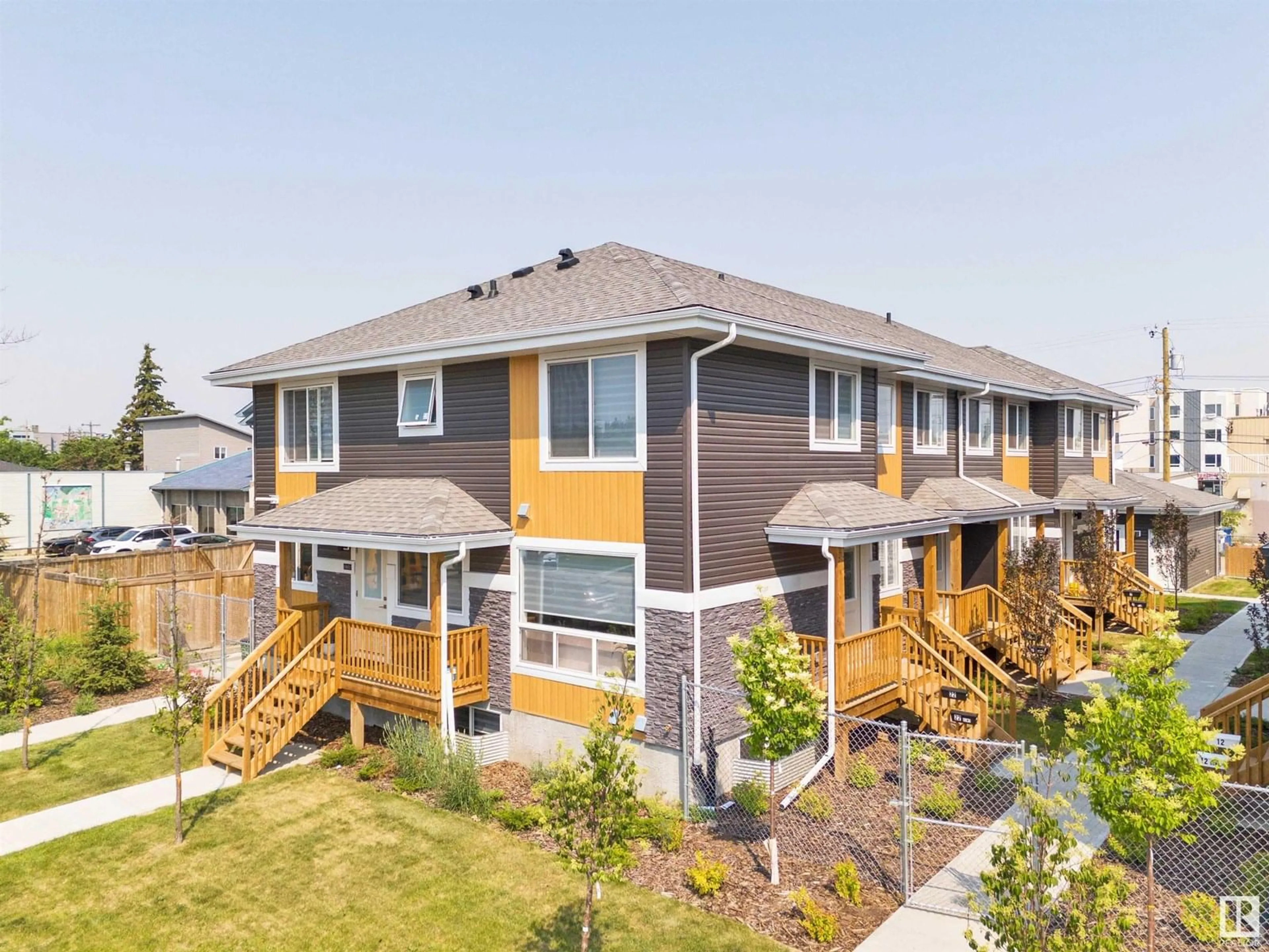 A pic from outside/outdoor area/front of a property/back of a property/a pic from drone, unknown for 15822 100A AV, Edmonton Alberta T5P0L8