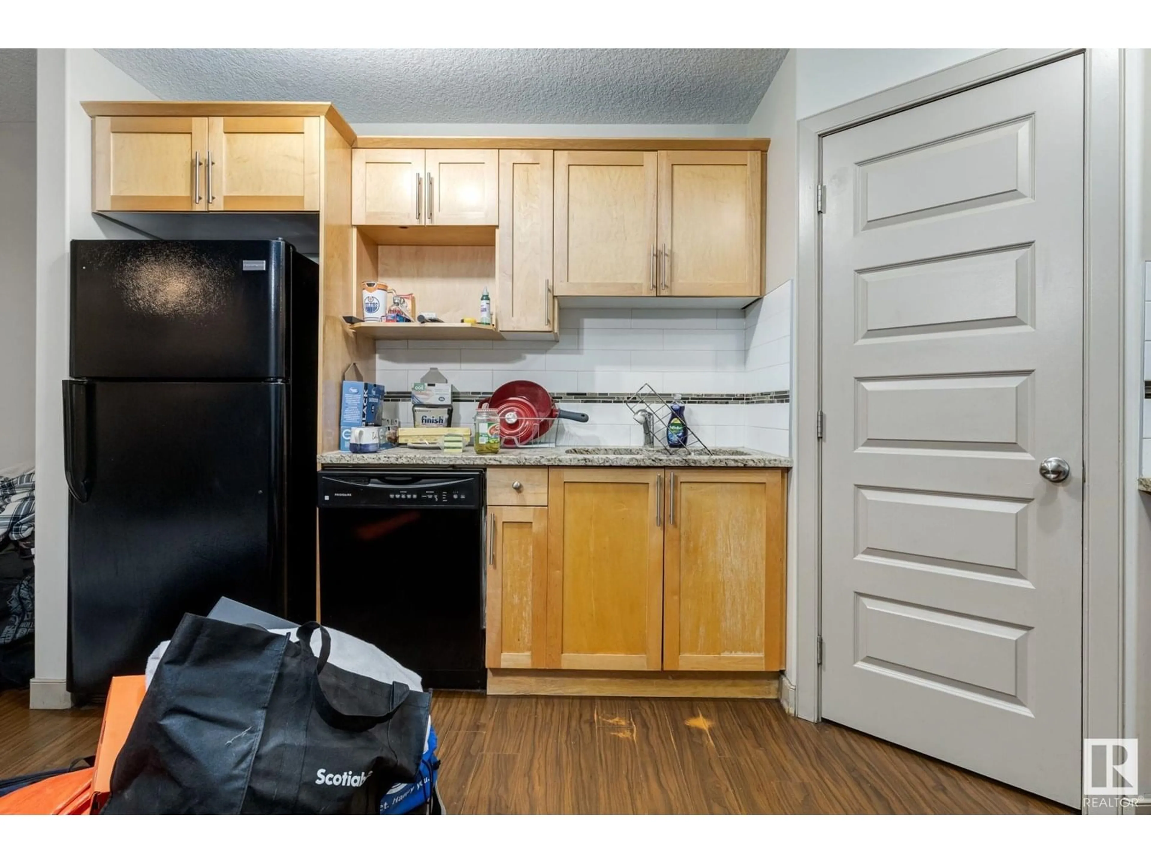 Standard kitchen, wood/laminate floor for #3 - 1820 34 AV, Edmonton Alberta T6T0N9