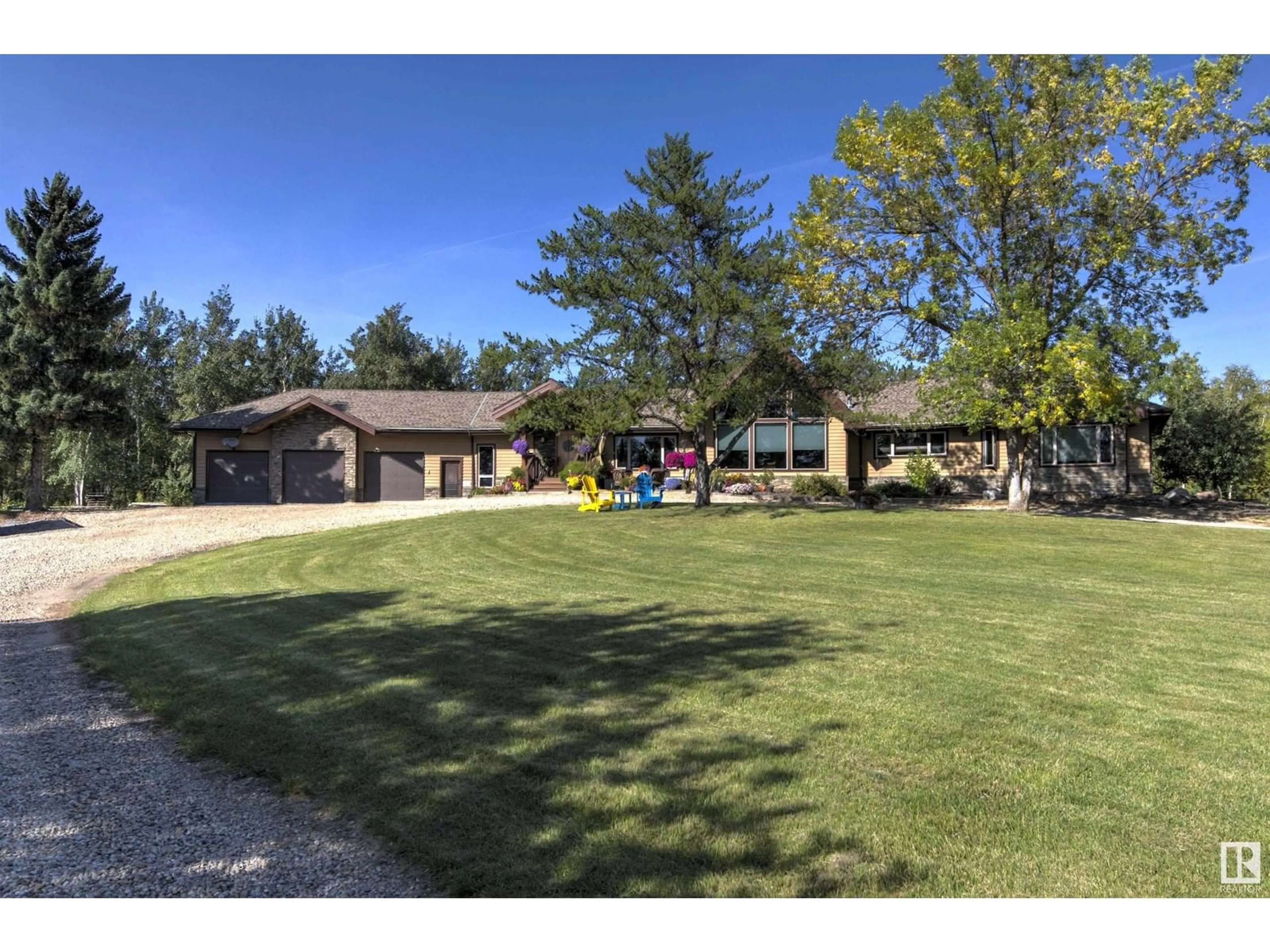 A pic from outside/outdoor area/front of a property/back of a property/a pic from drone, unknown for 25 - 52550 RGE RD 225, Rural Strathcona County Alberta T8A4S4