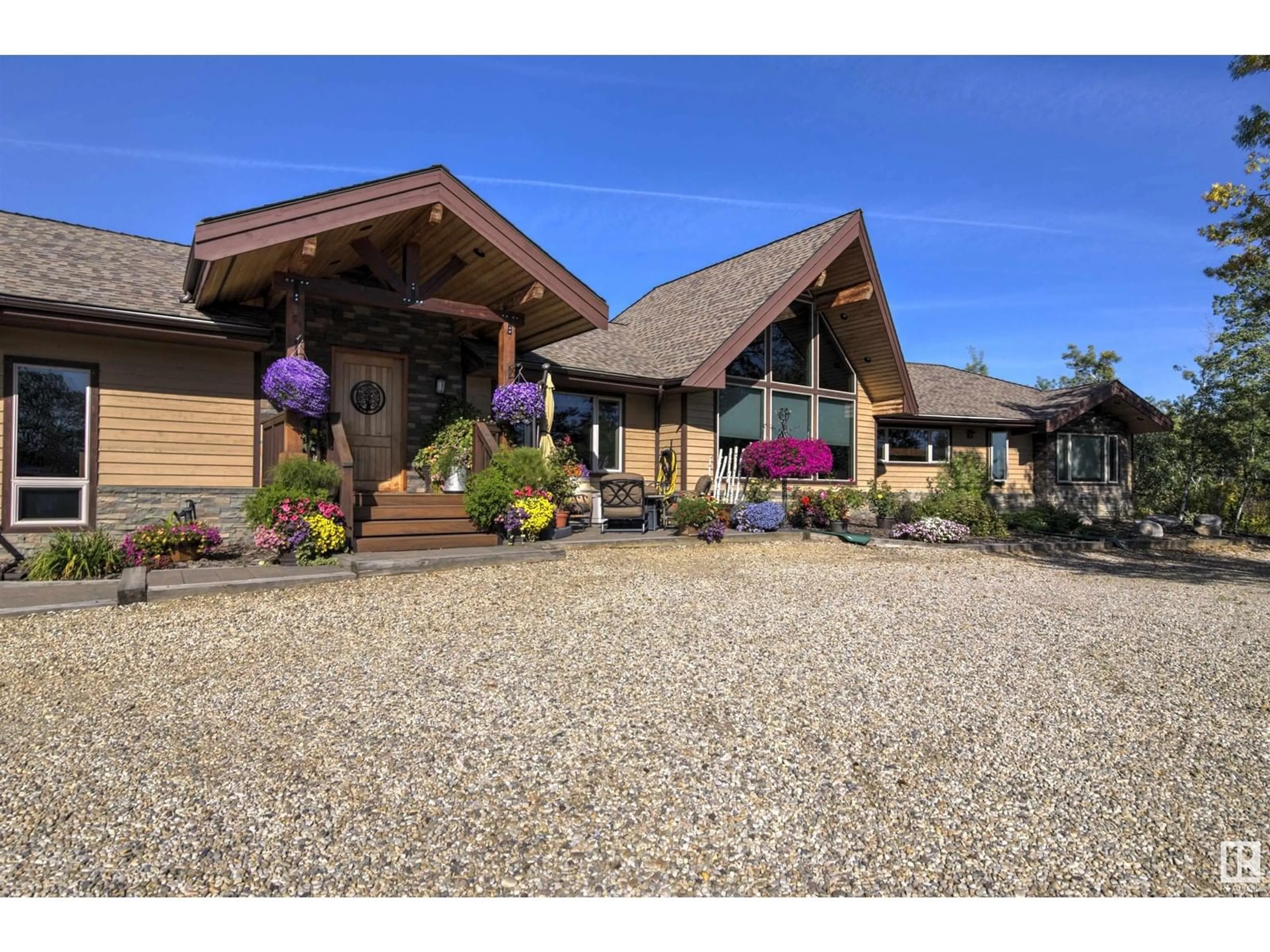A pic from outside/outdoor area/front of a property/back of a property/a pic from drone, unknown for 25 - 52550 RGE RD 225, Rural Strathcona County Alberta T8A4S4