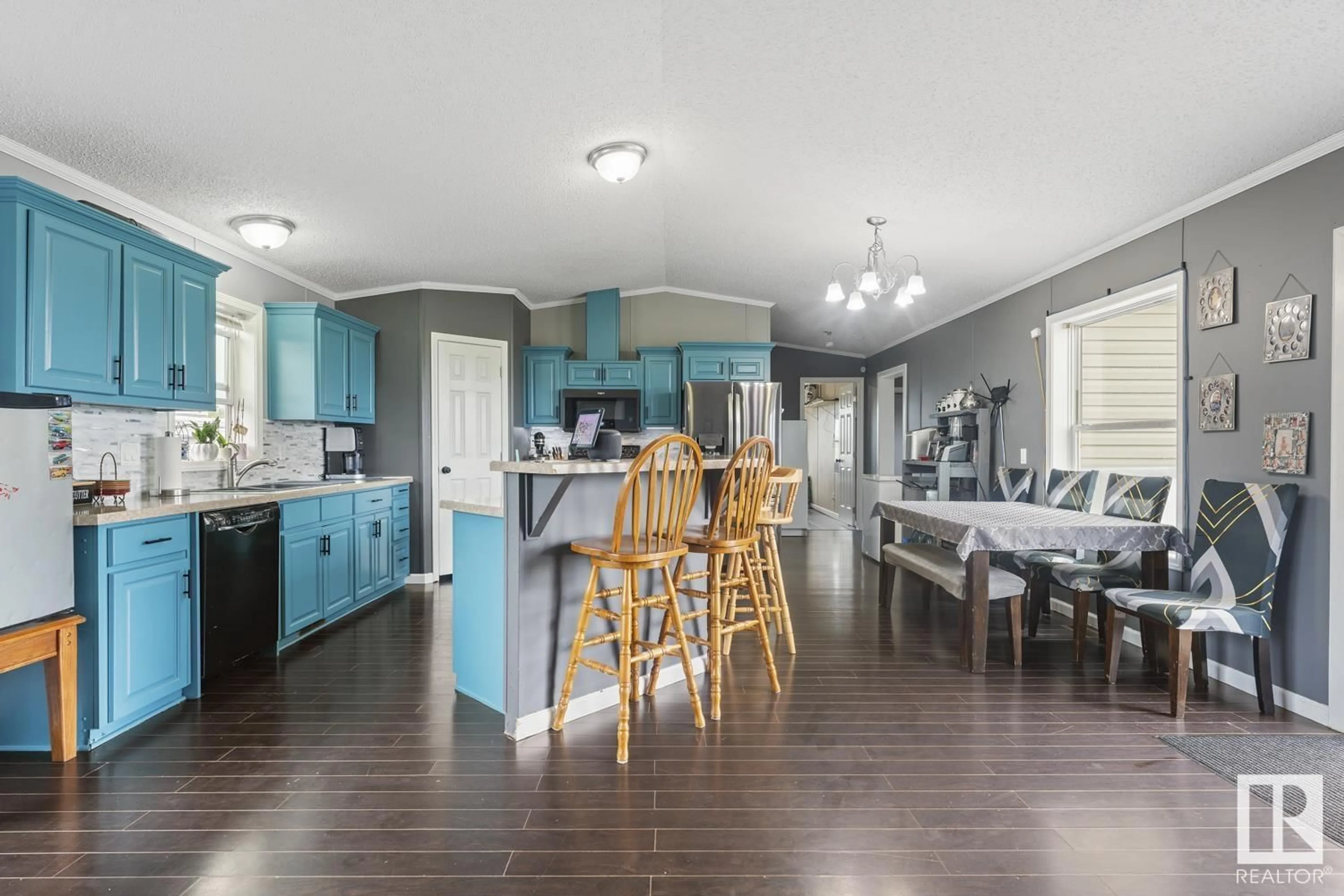 Open concept kitchen, wood/laminate floor for 42025 TOWNSHIP ROAD 614, Rural Bonnyville M.D. Alberta T9M0T0