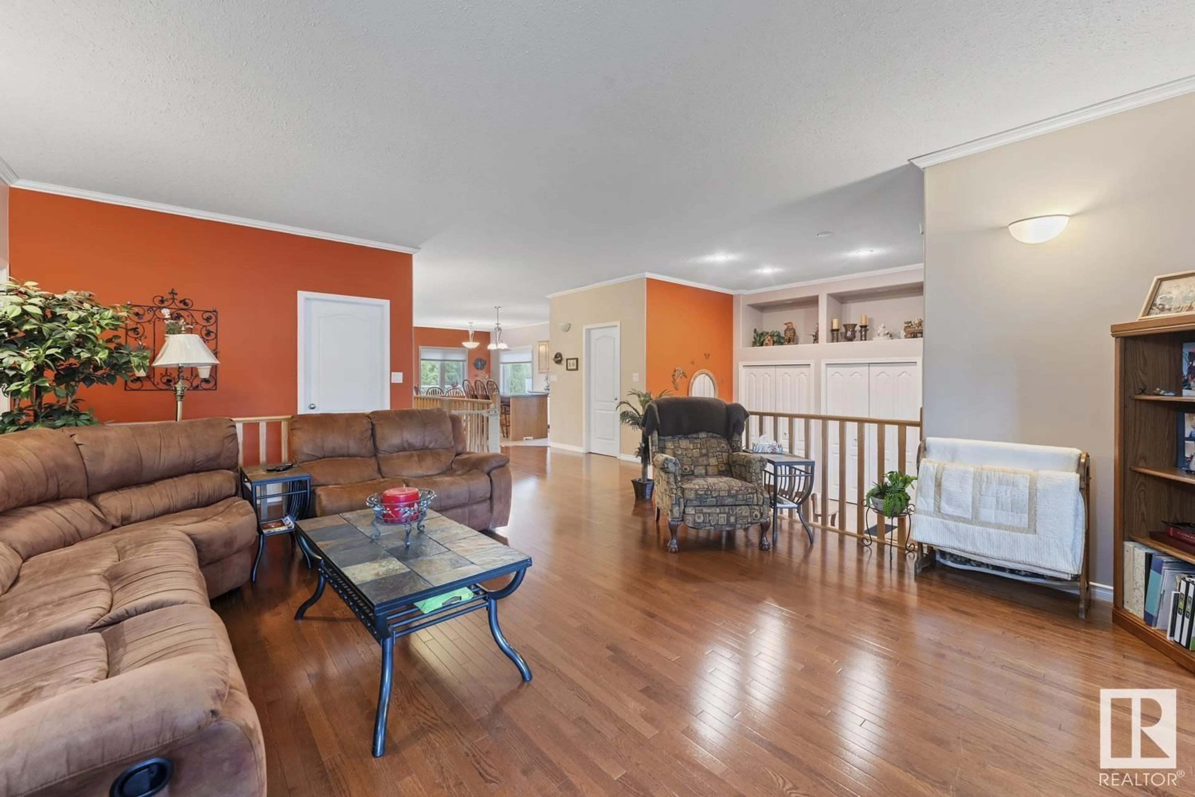 Living room with furniture, wood/laminate floor for 609 26 STREET ST, Cold Lake Alberta T9M1M6