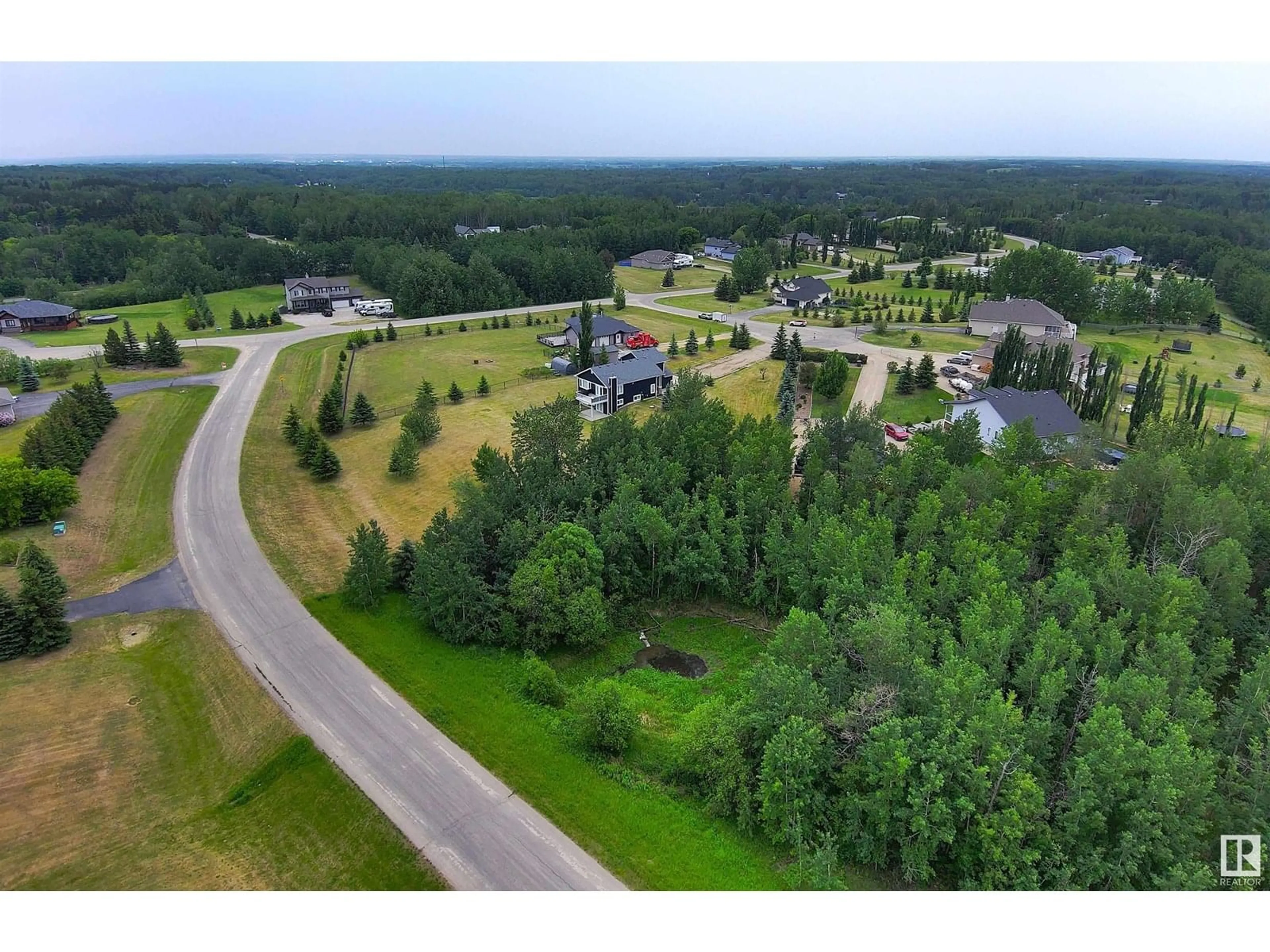 A pic from outside/outdoor area/front of a property/back of a property/a pic from drone, unknown for 53122 - 22 RGE ROAD 14, Rural Parkland County Alberta T7Y2T3