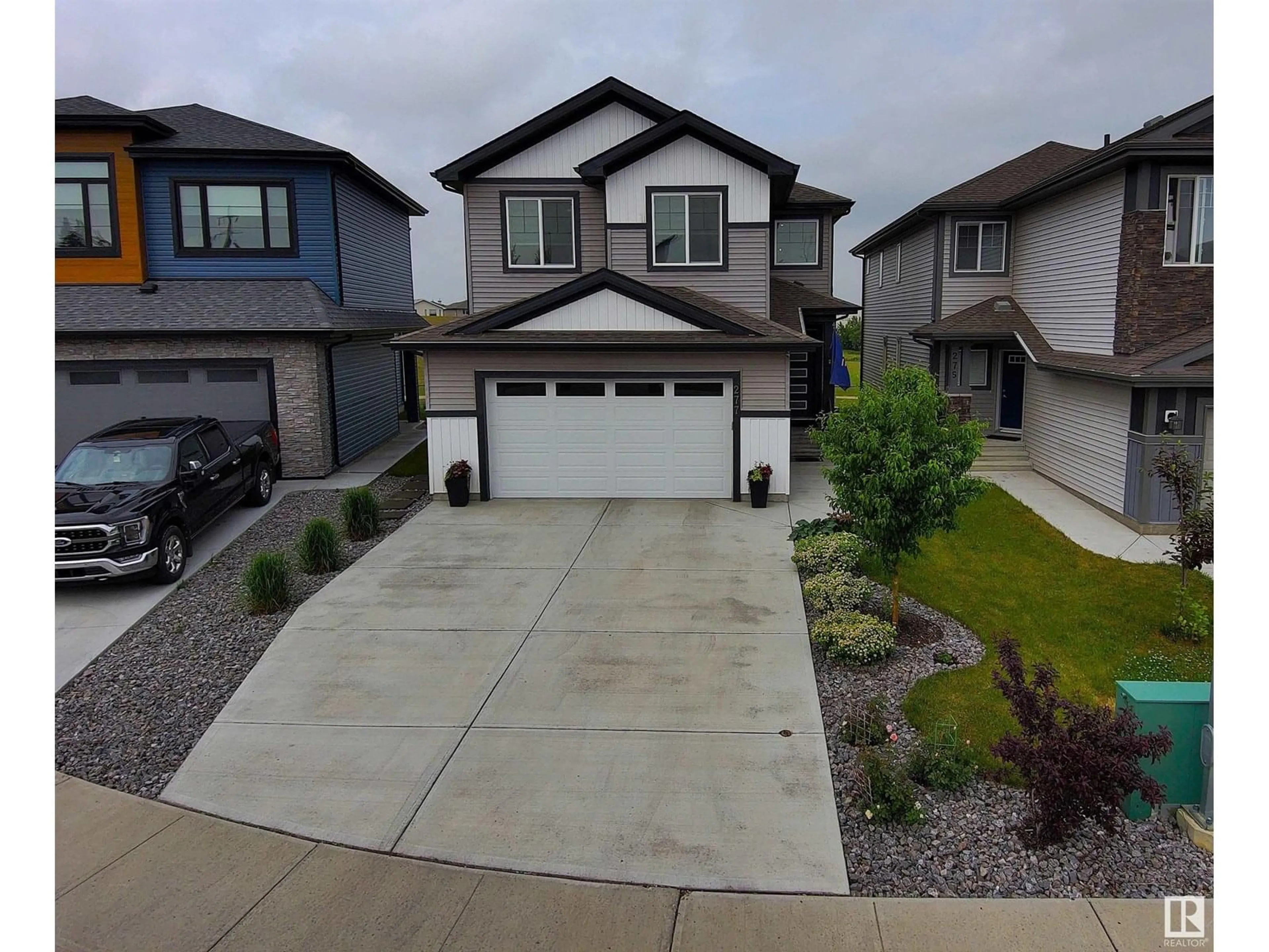 A pic from outside/outdoor area/front of a property/back of a property/a pic from drone, street for 277 SILVERSTONE CR, Stony Plain Alberta T7Z0E8