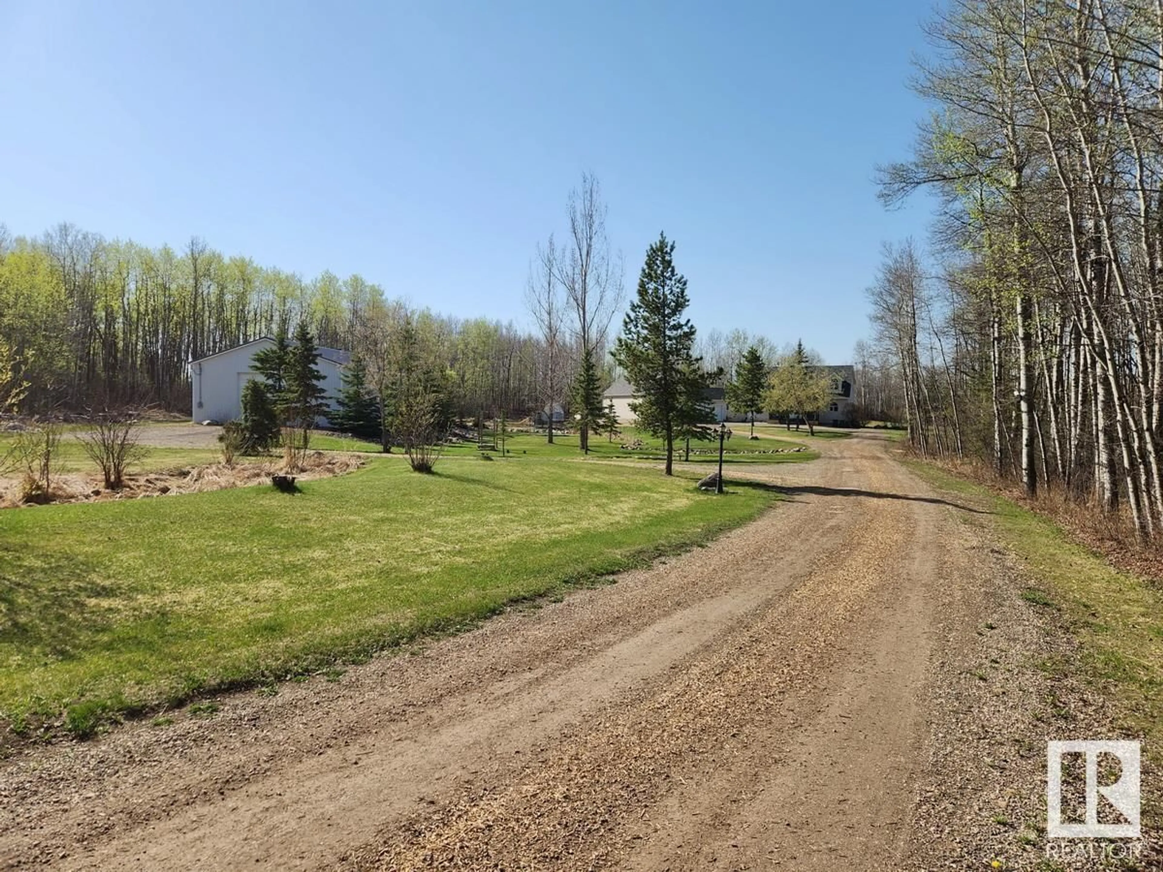 A pic from outside/outdoor area/front of a property/back of a property/a pic from drone, forest/trees view for 52510 - 61 RGE ROAD 213, Rural Strathcona County Alberta T8E2G6