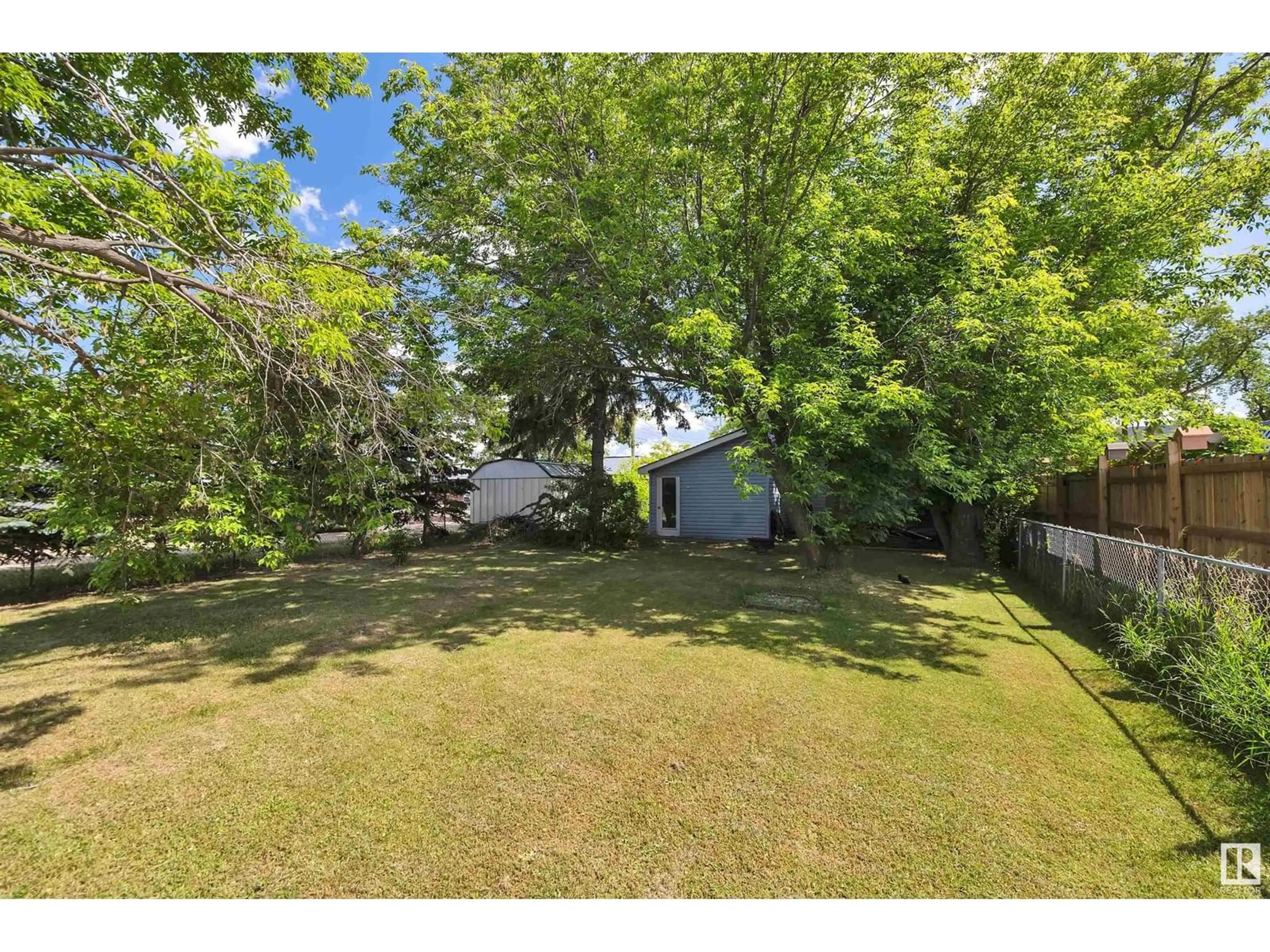 A pic from outside/outdoor area/front of a property/back of a property/a pic from drone, unknown for 5012 49 AV, Millet Alberta T0C1Z0