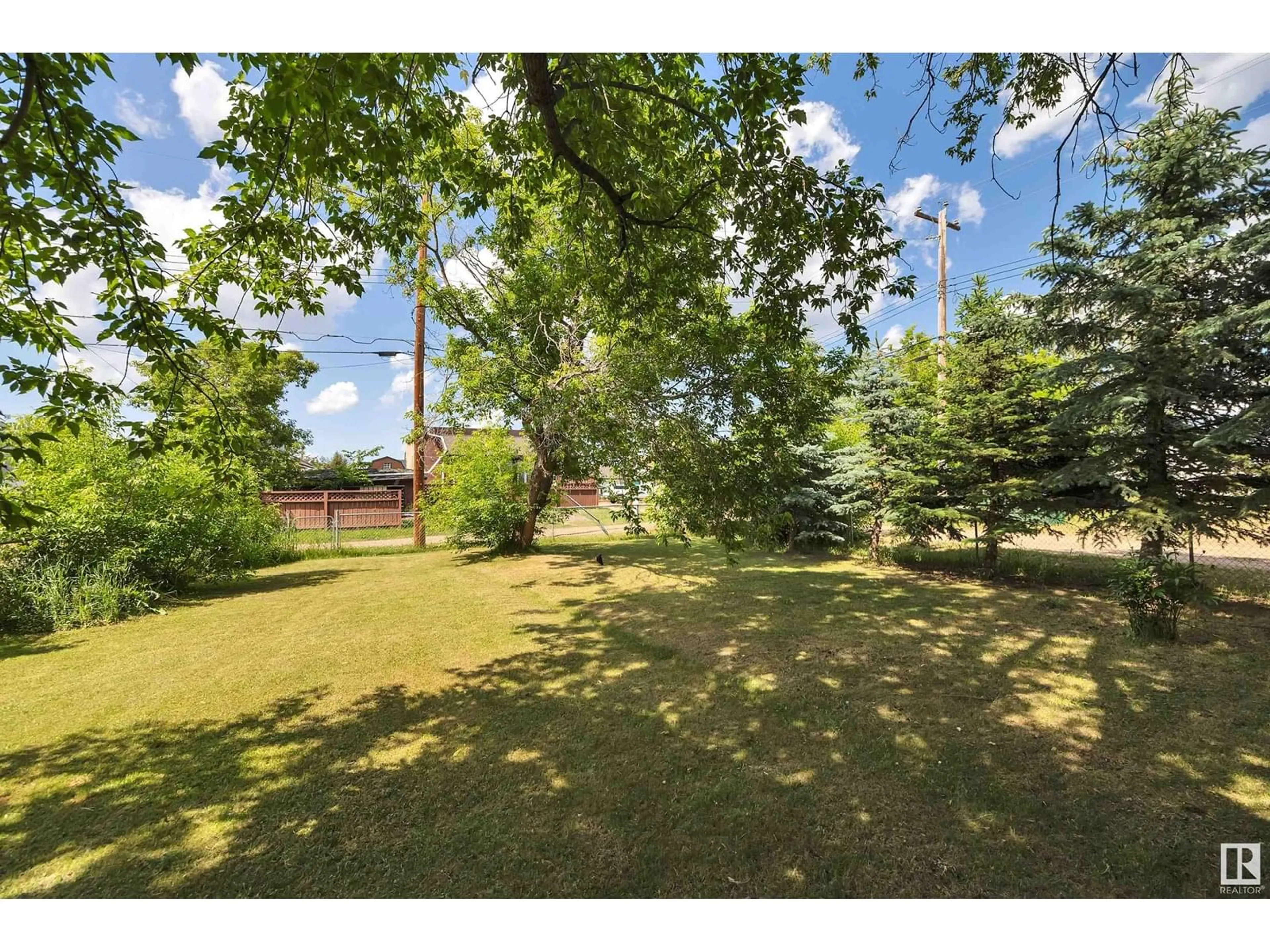 A pic from outside/outdoor area/front of a property/back of a property/a pic from drone, unknown for 5012 49 AV, Millet Alberta T0C1Z0