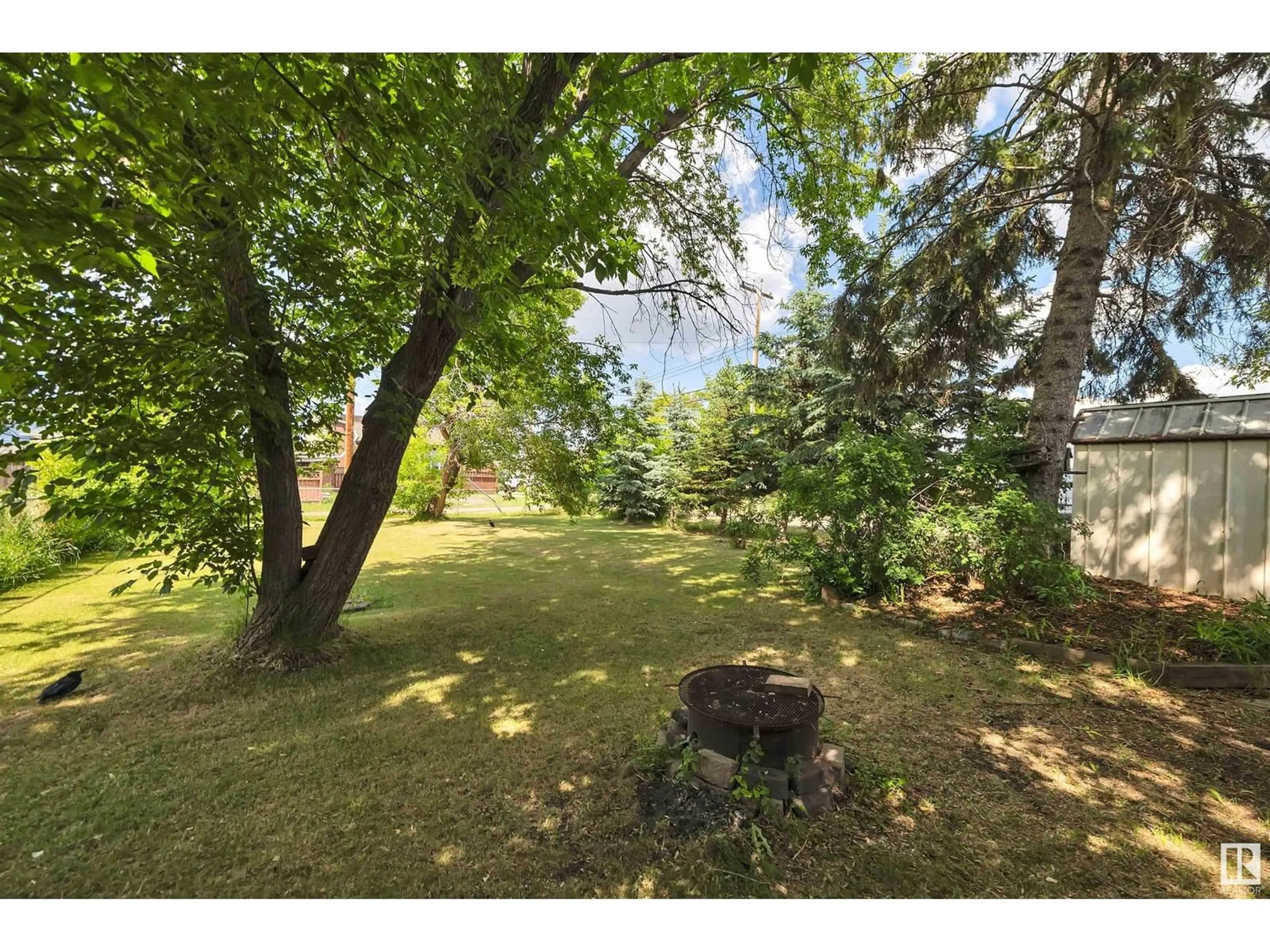 Patio, forest/trees view for 5012 49 AV, Millet Alberta T0C1Z0