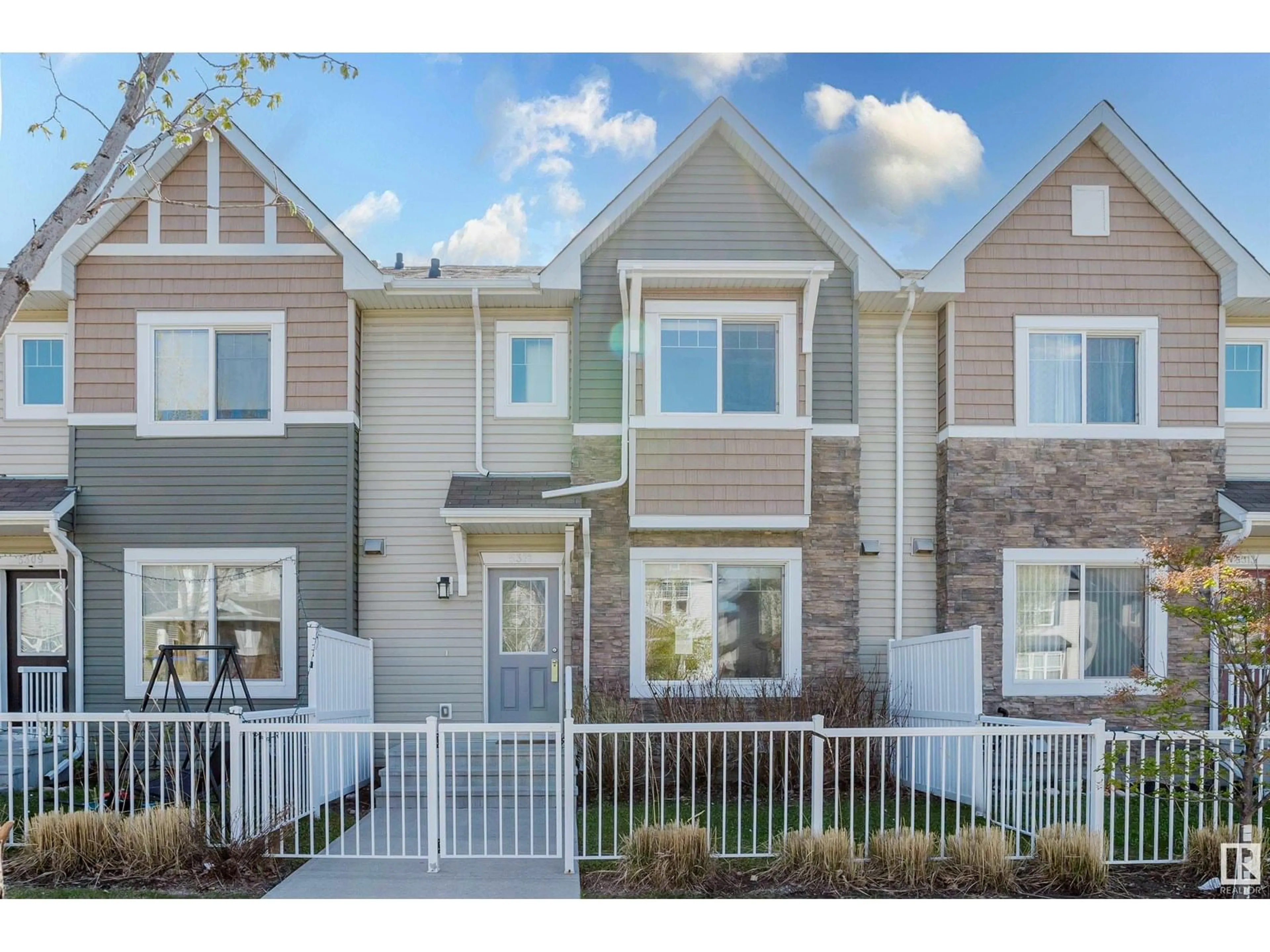 Home with vinyl exterior material, street for 5309 3 AV SW, Edmonton Alberta T6K0W7