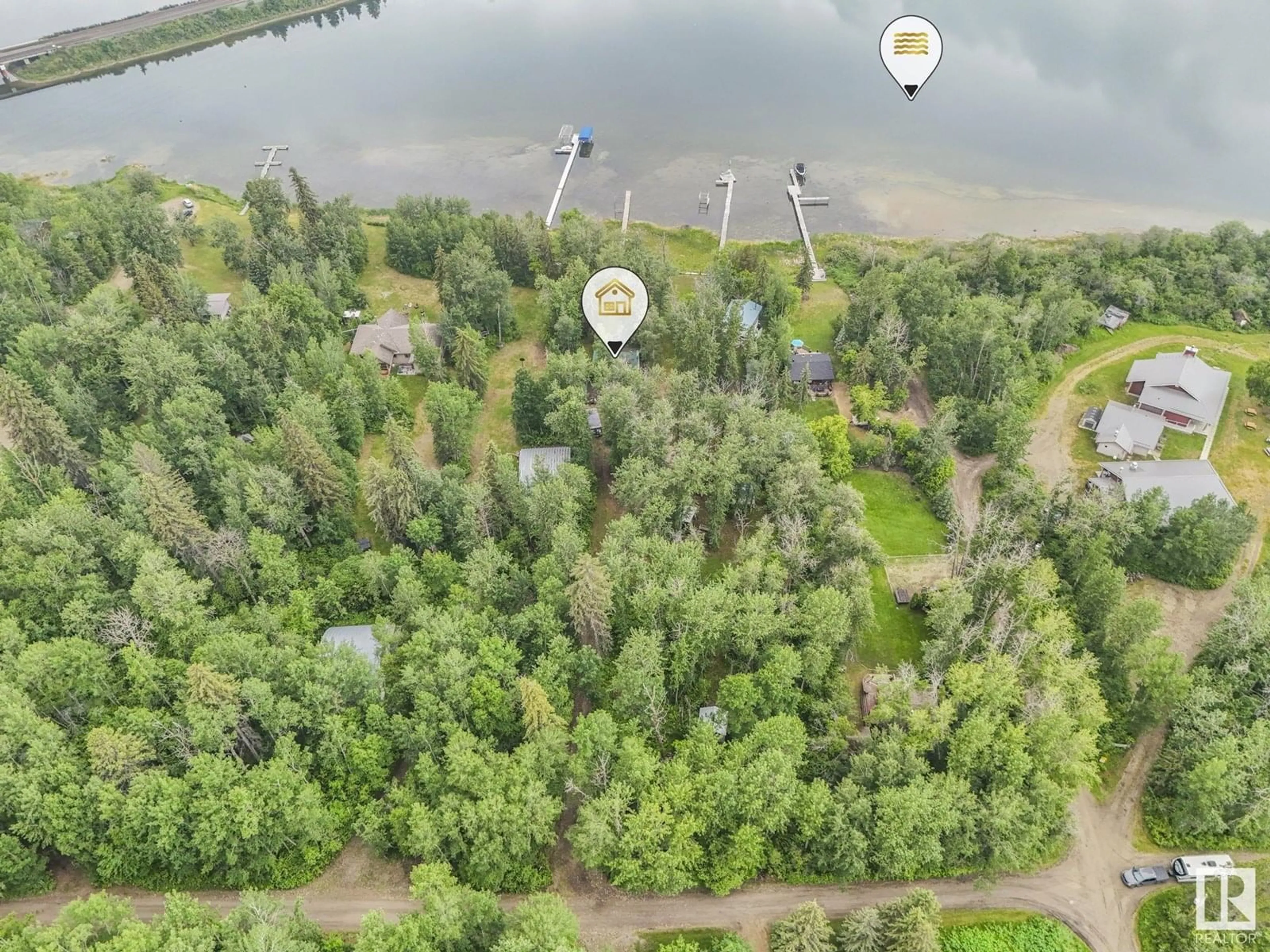 A pic from outside/outdoor area/front of a property/back of a property/a pic from drone, water/lake/river/ocean view for 1306 RGE ROAD 40, Rural Parkland County Alberta T0E2Y0