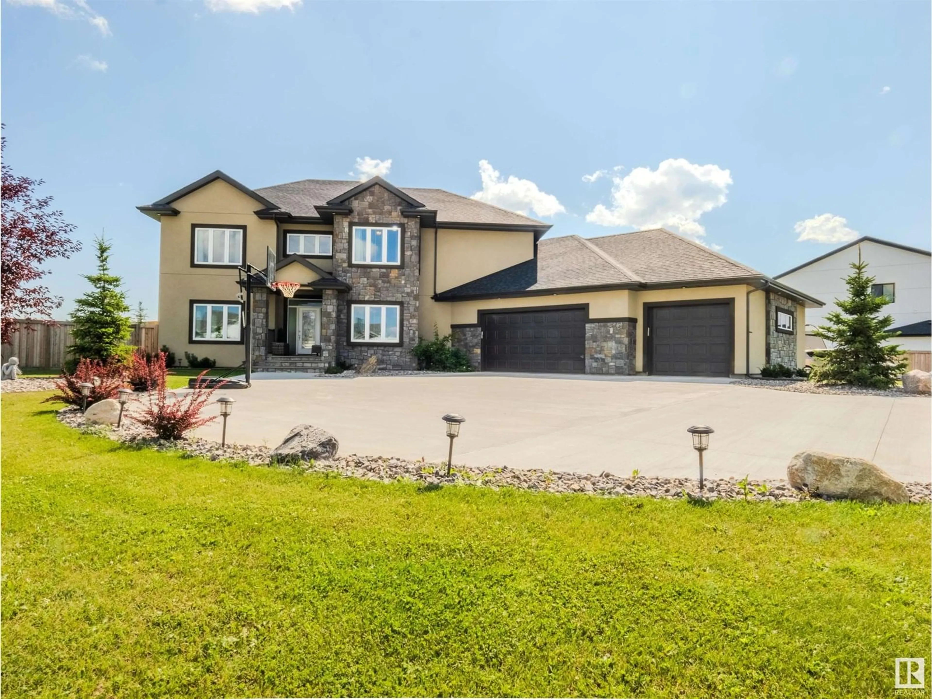 Home with vinyl exterior material, street for 69 26409 TWP ROAD 532 A, Rural Parkland County Alberta T7X0W7