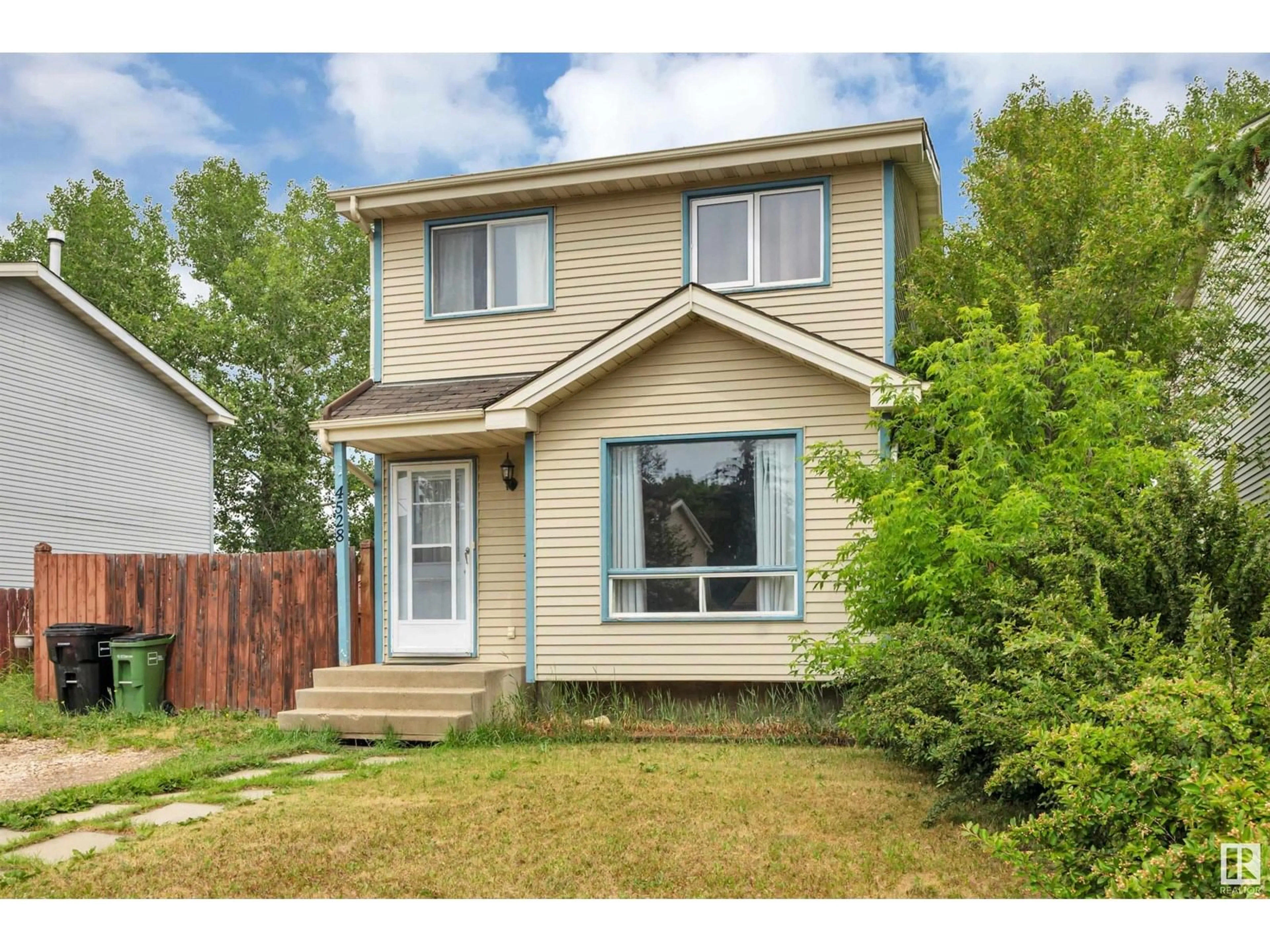 Home with vinyl exterior material, street for 4528 33A AVE NW, Edmonton Alberta T6L4X3