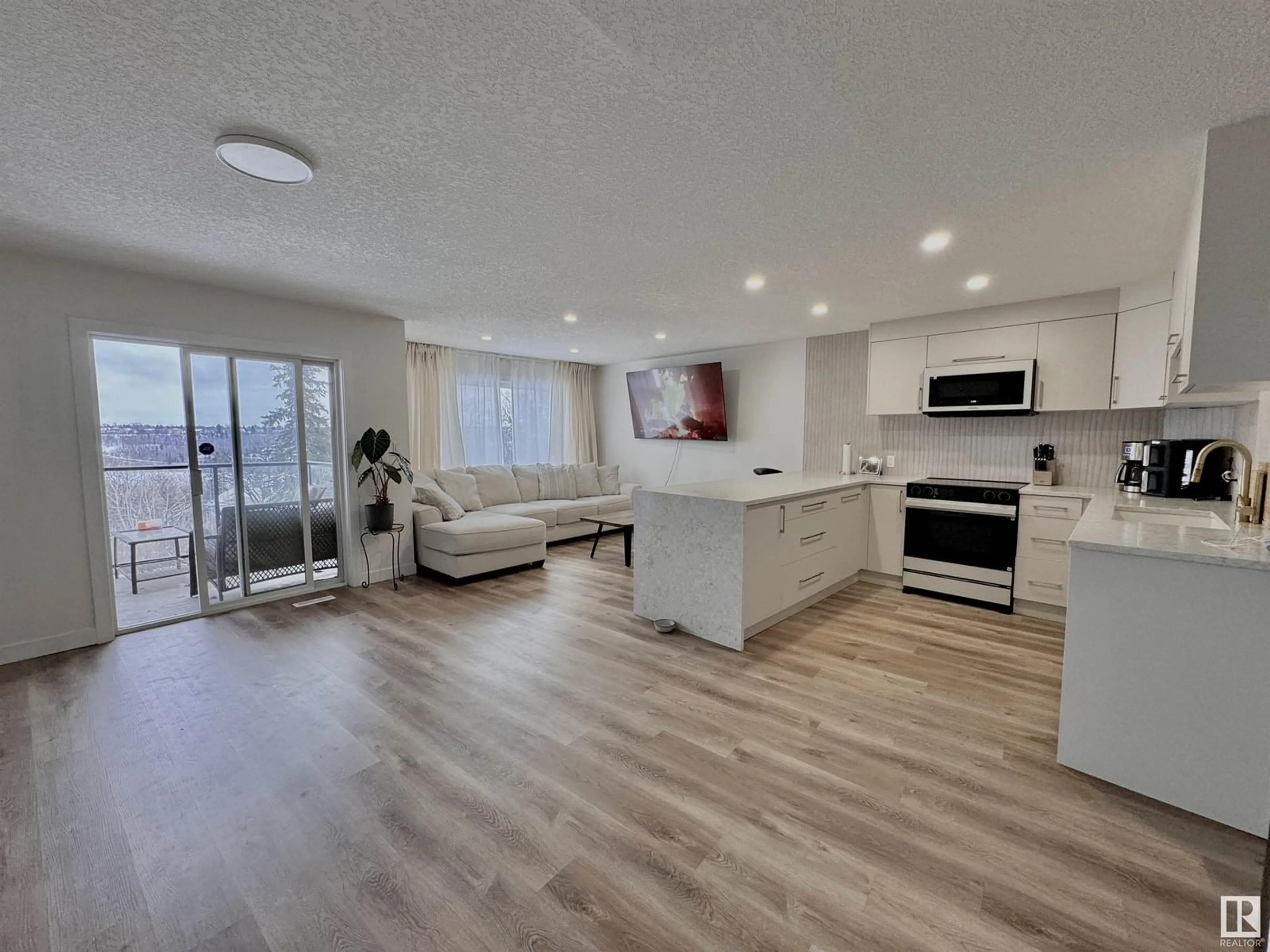 Open concept kitchen, unknown for #108 - 10105 95 ST, Edmonton Alberta T5H4M4