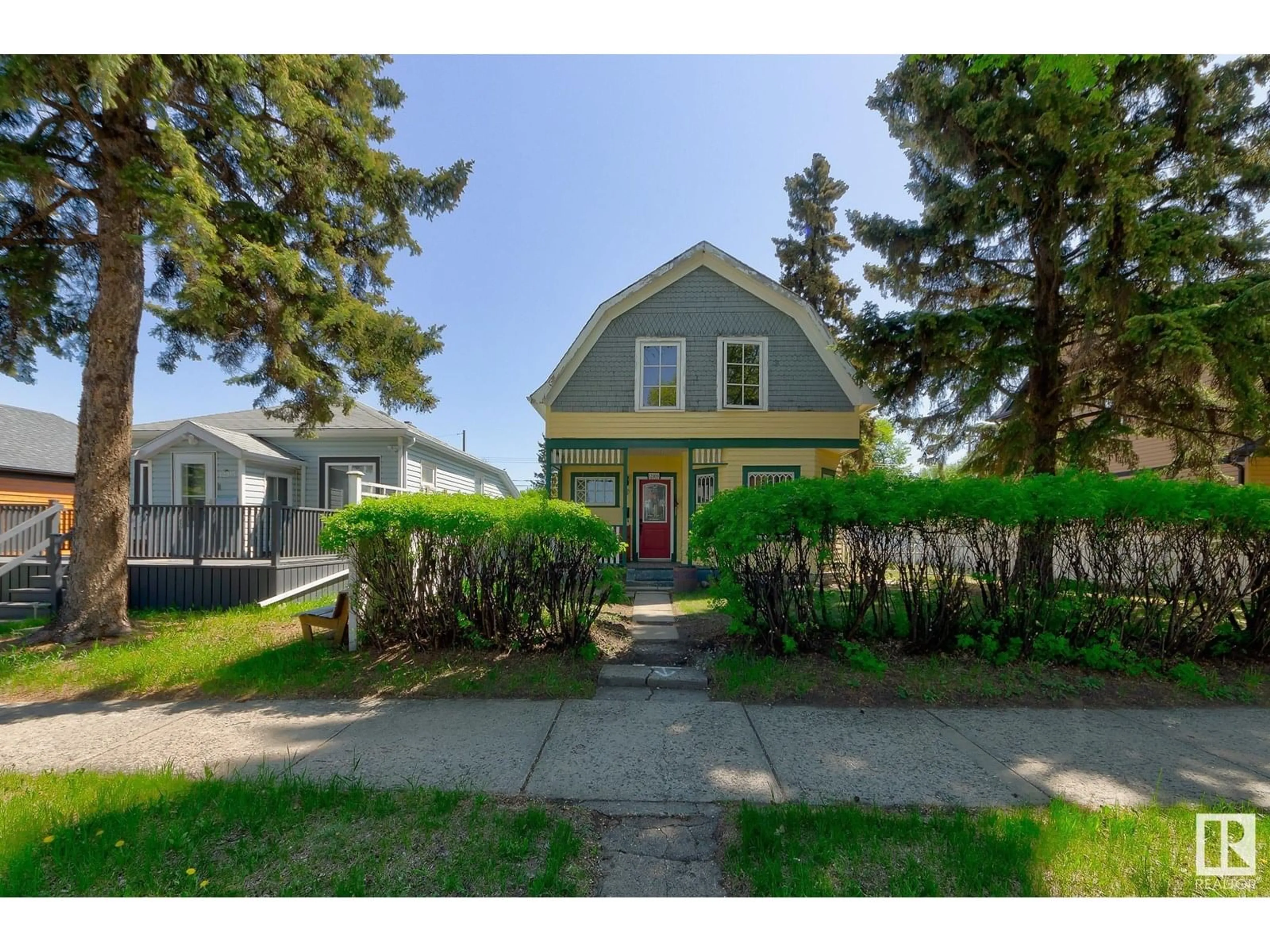 A pic from outside/outdoor area/front of a property/back of a property/a pic from drone, street for 12909 121 ST, Edmonton Alberta T5L0B3