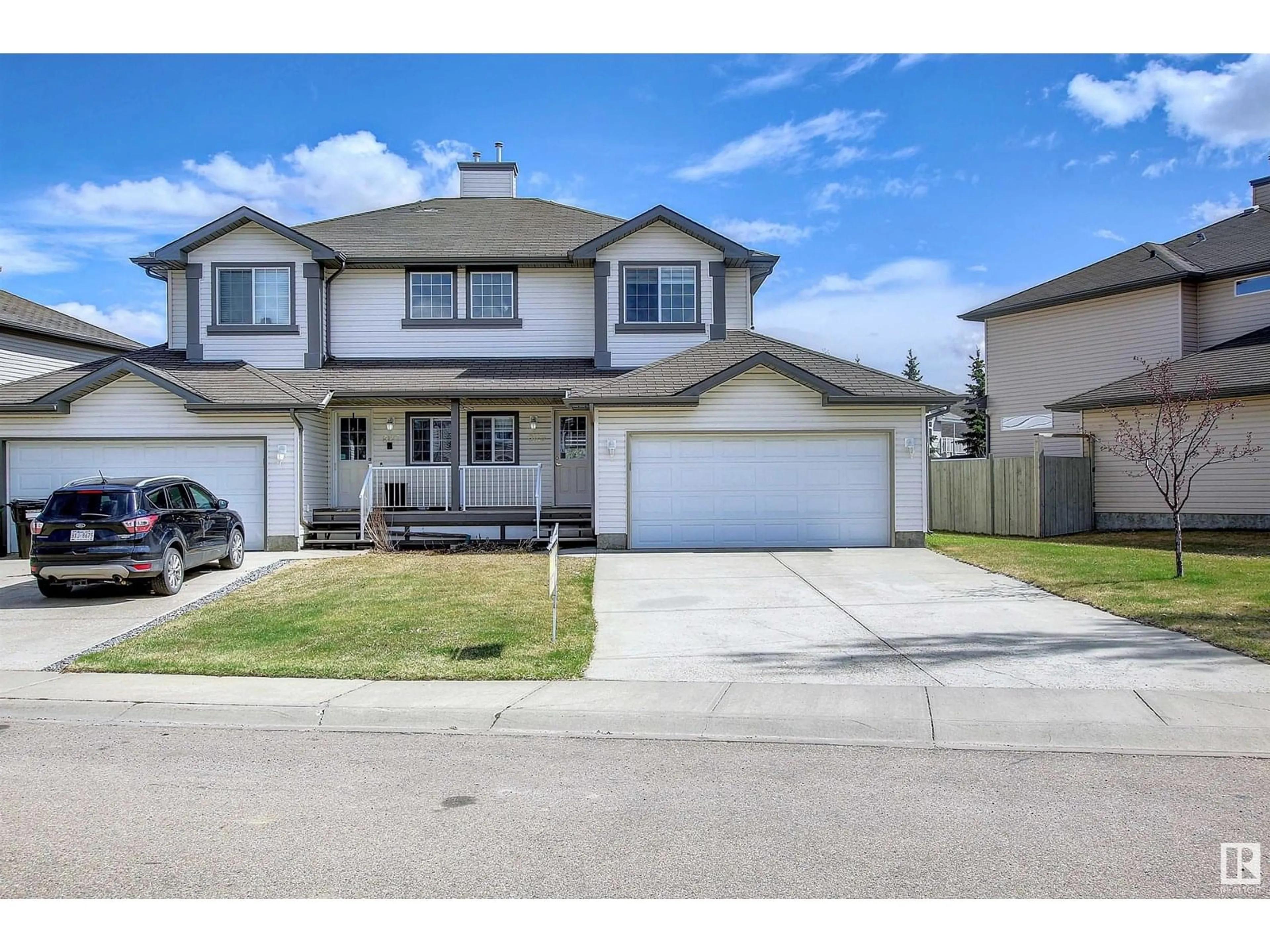 Home with vinyl exterior material, street for SW - 8129 7 AV, Edmonton Alberta T6X1L9