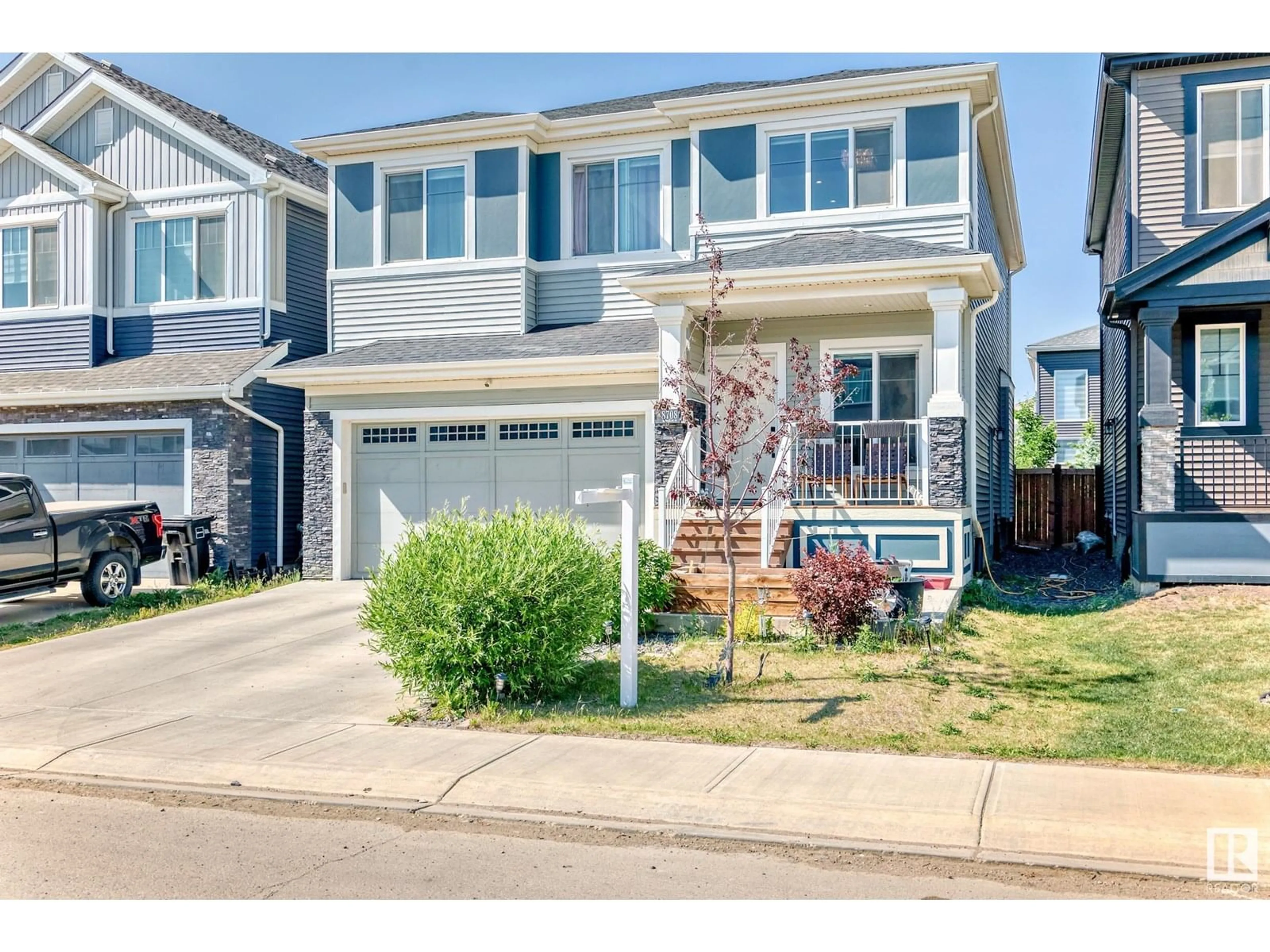 Home with vinyl exterior material, street for 8708 MAYDAY LN, Edmonton Alberta T6X2L3