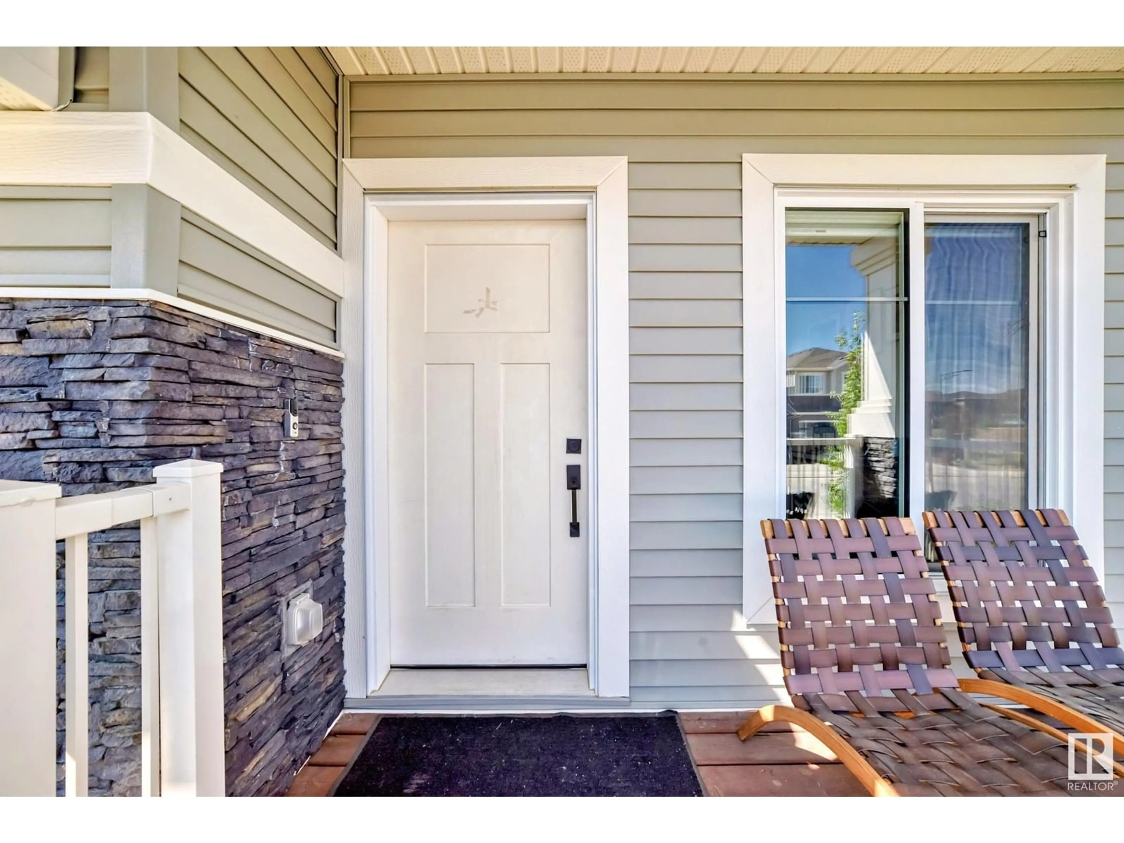 Home with vinyl exterior material, street for 8708 MAYDAY LN, Edmonton Alberta T6X2L3