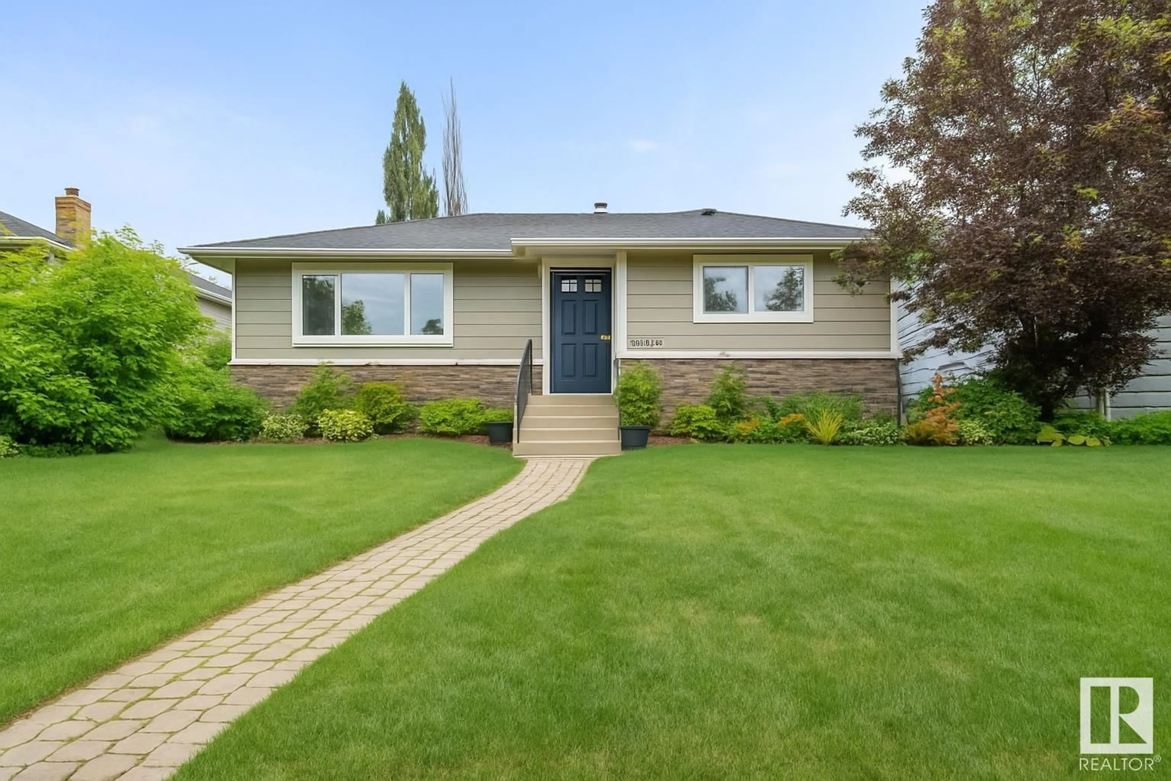 Home with vinyl exterior material, street for 8943 146A ST, Edmonton Alberta T5R0X2