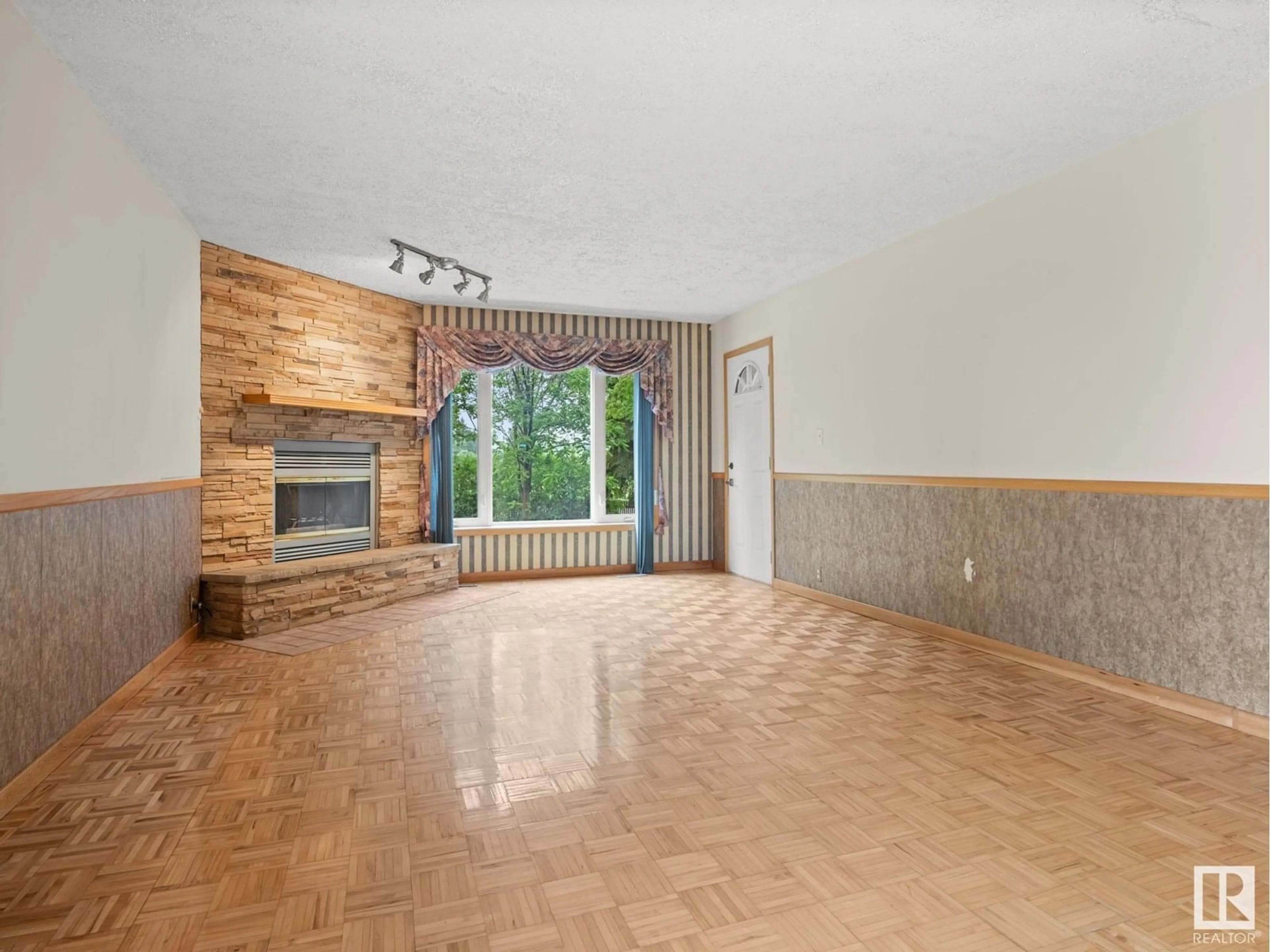 Living room with furniture, wood/laminate floor for 4721 51 ST, Bon Accord Alberta T0A0K0