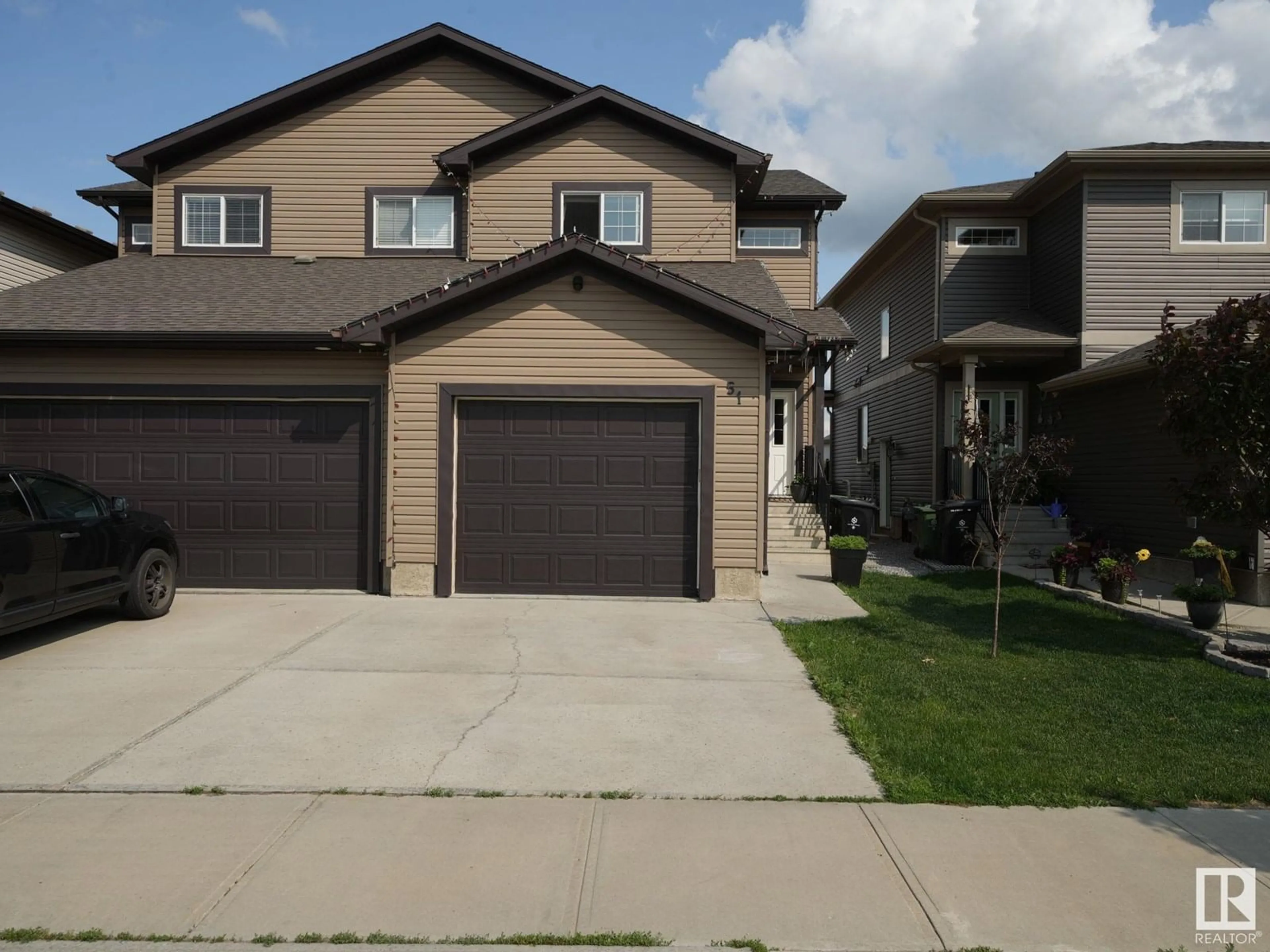 Home with vinyl exterior material, street for 51 RICHMOND LI, Fort Saskatchewan Alberta T8L0S2