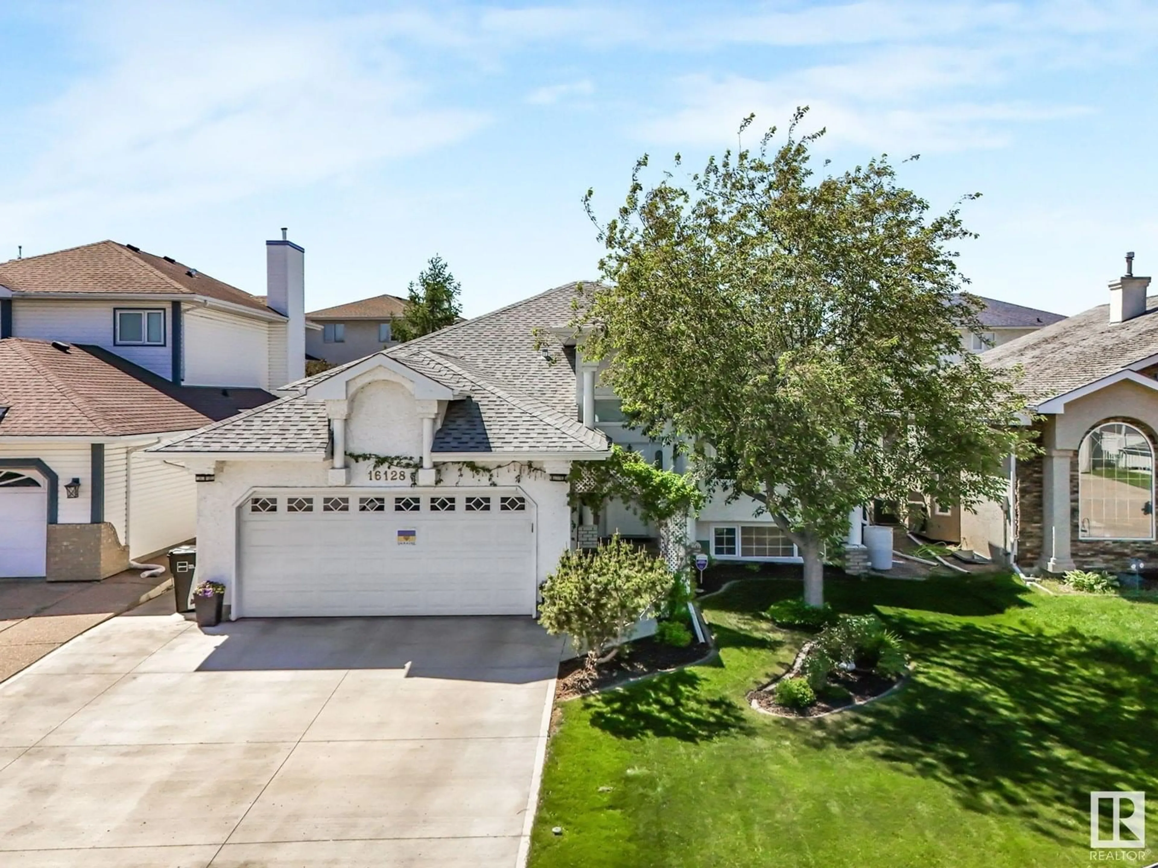 A pic from outside/outdoor area/front of a property/back of a property/a pic from drone, street for NW - 16128 56 ST, Edmonton Alberta T5Y2T9