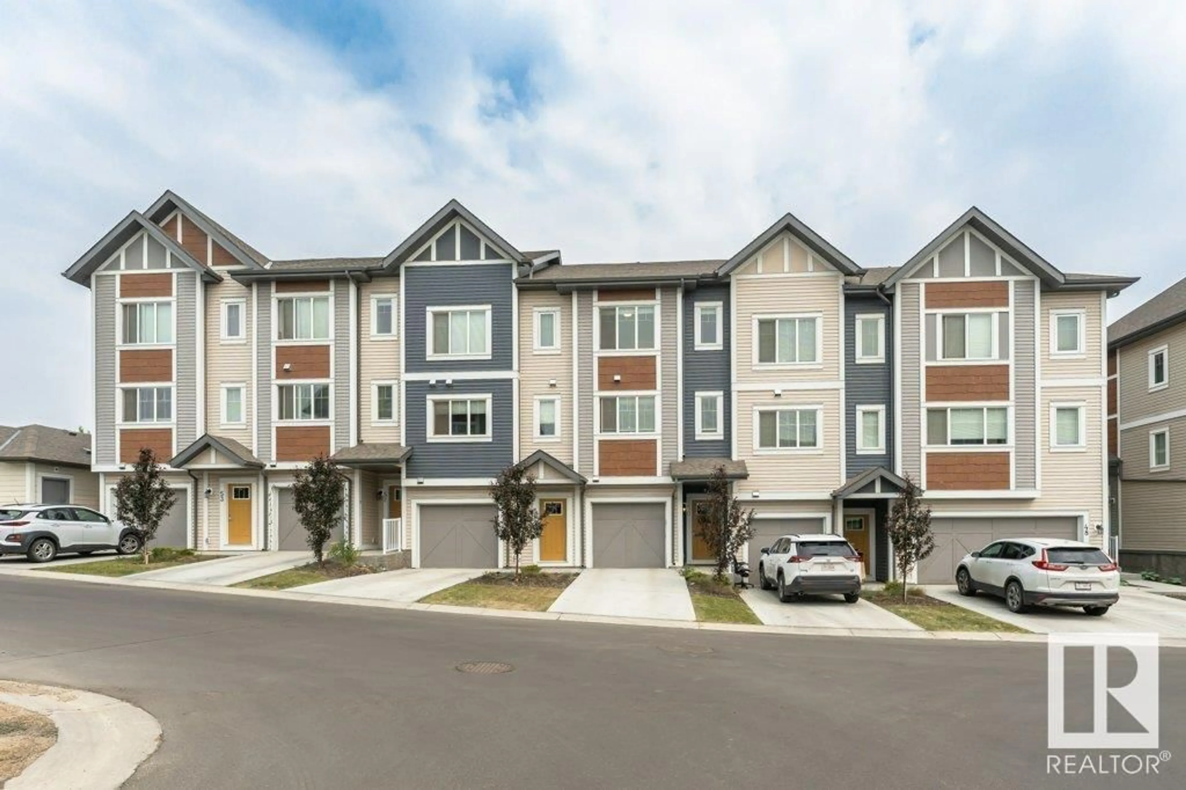 Home with vinyl exterior material, street for #50 - 320 SECORD BV, Edmonton Alberta T5T7E8