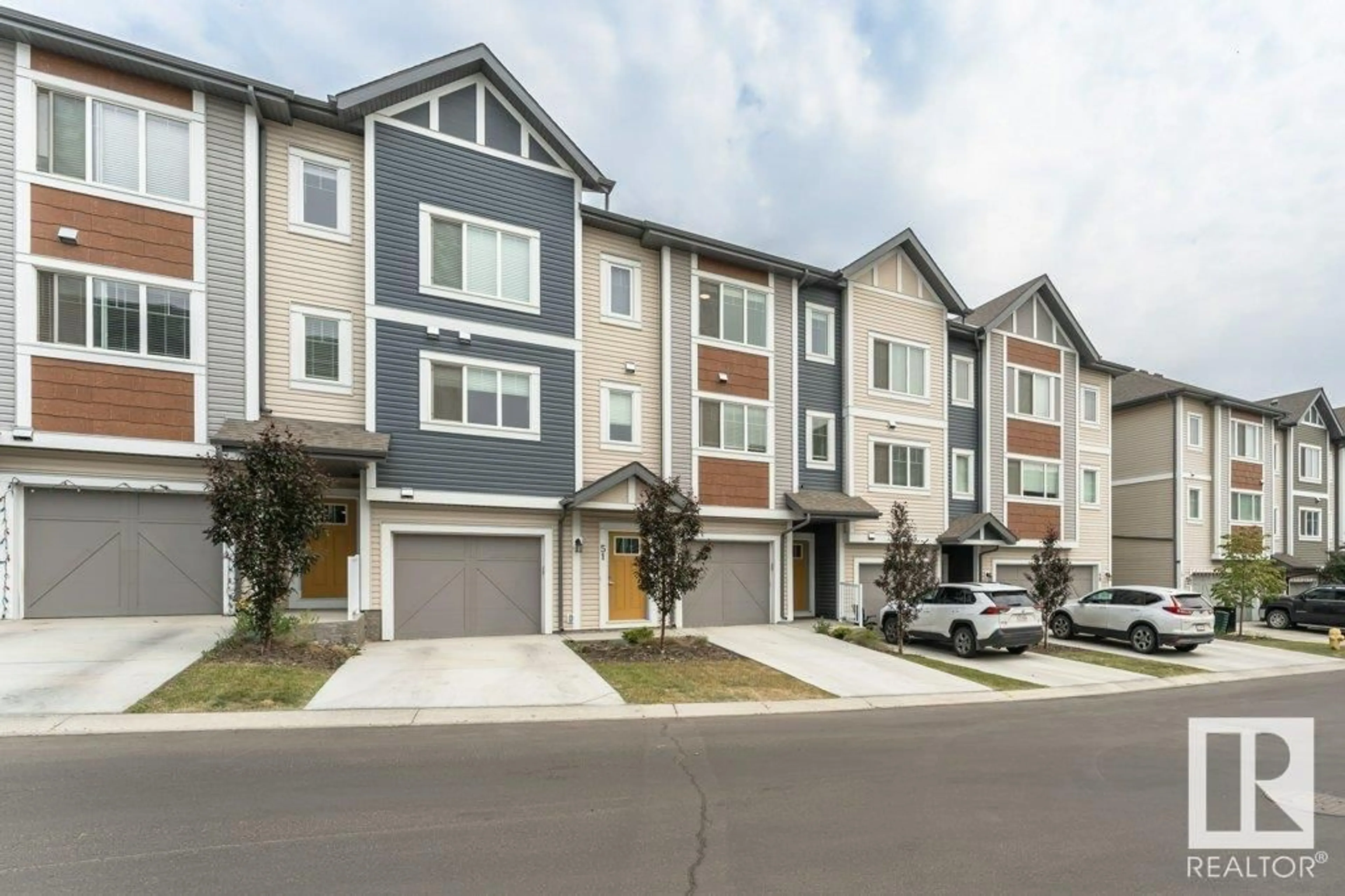 Home with vinyl exterior material, street for #50 - 320 SECORD BV, Edmonton Alberta T5T7E8