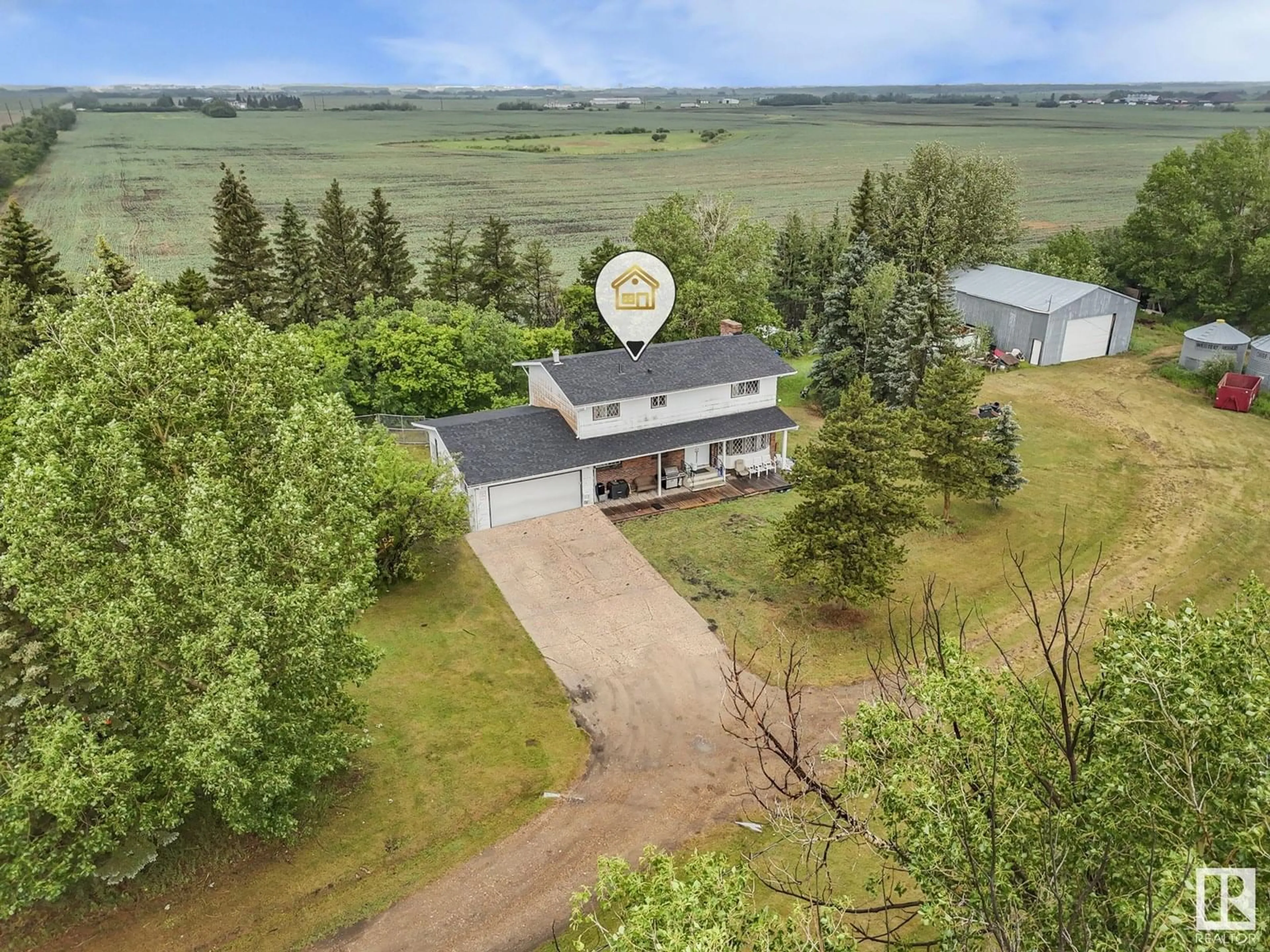 A pic from outside/outdoor area/front of a property/back of a property/a pic from drone, mountain view for NW - 4150 195 AV, Edmonton Alberta T5Y6N4