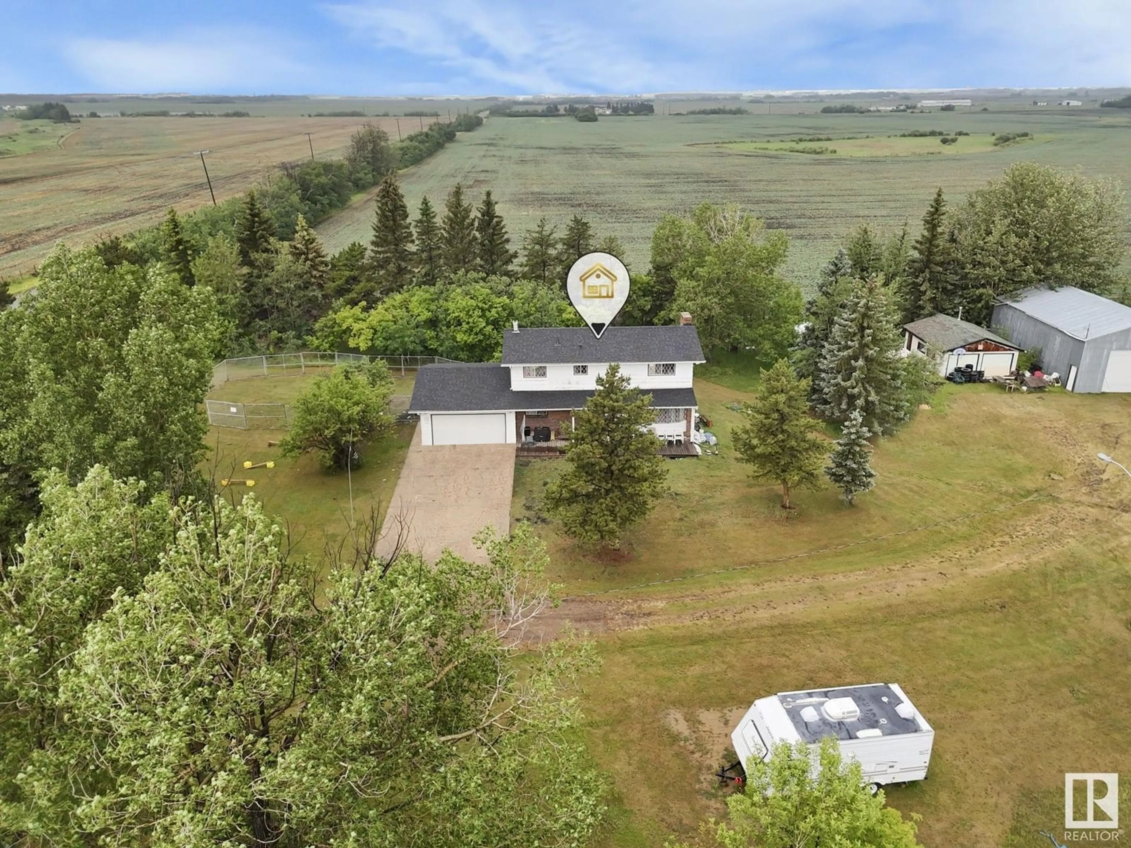 A pic from outside/outdoor area/front of a property/back of a property/a pic from drone, mountain view for NW - 4150 195 AV, Edmonton Alberta T5Y6N4