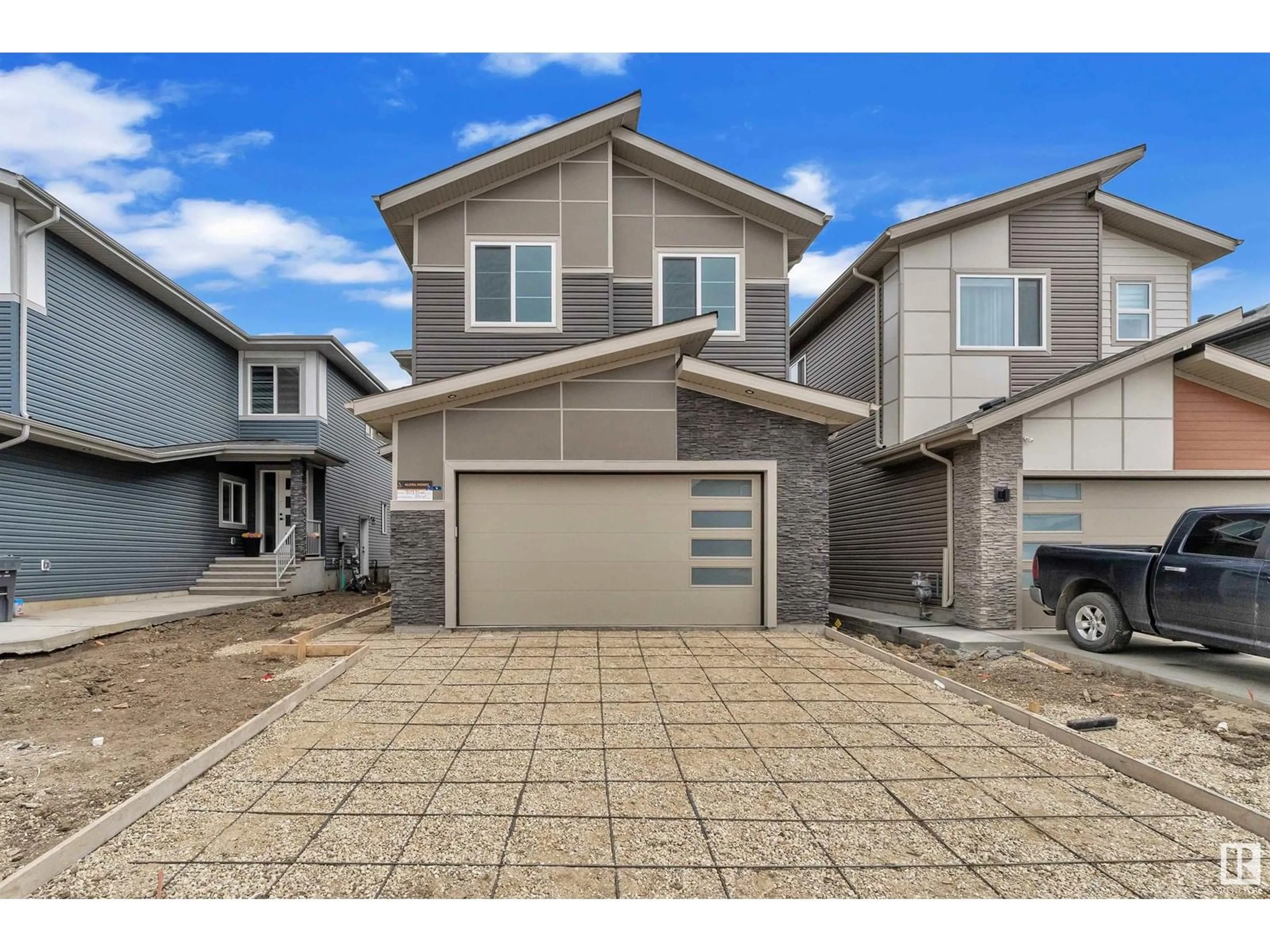 Home with vinyl exterior material, street for 404 PINE PT, Leduc Alberta T9E1S7
