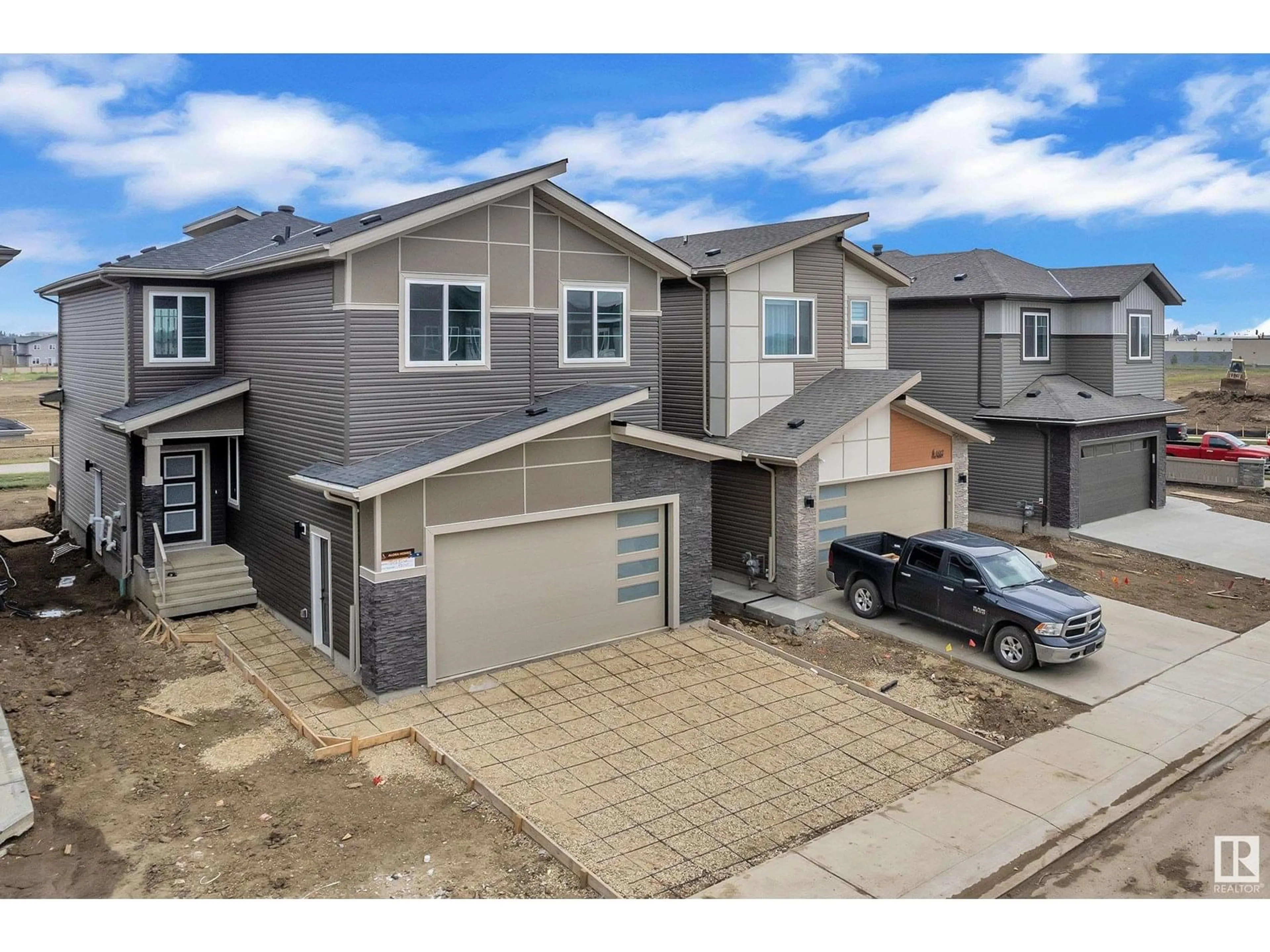 A pic from outside/outdoor area/front of a property/back of a property/a pic from drone, street for 404 PINE PT, Leduc Alberta T9E1S7