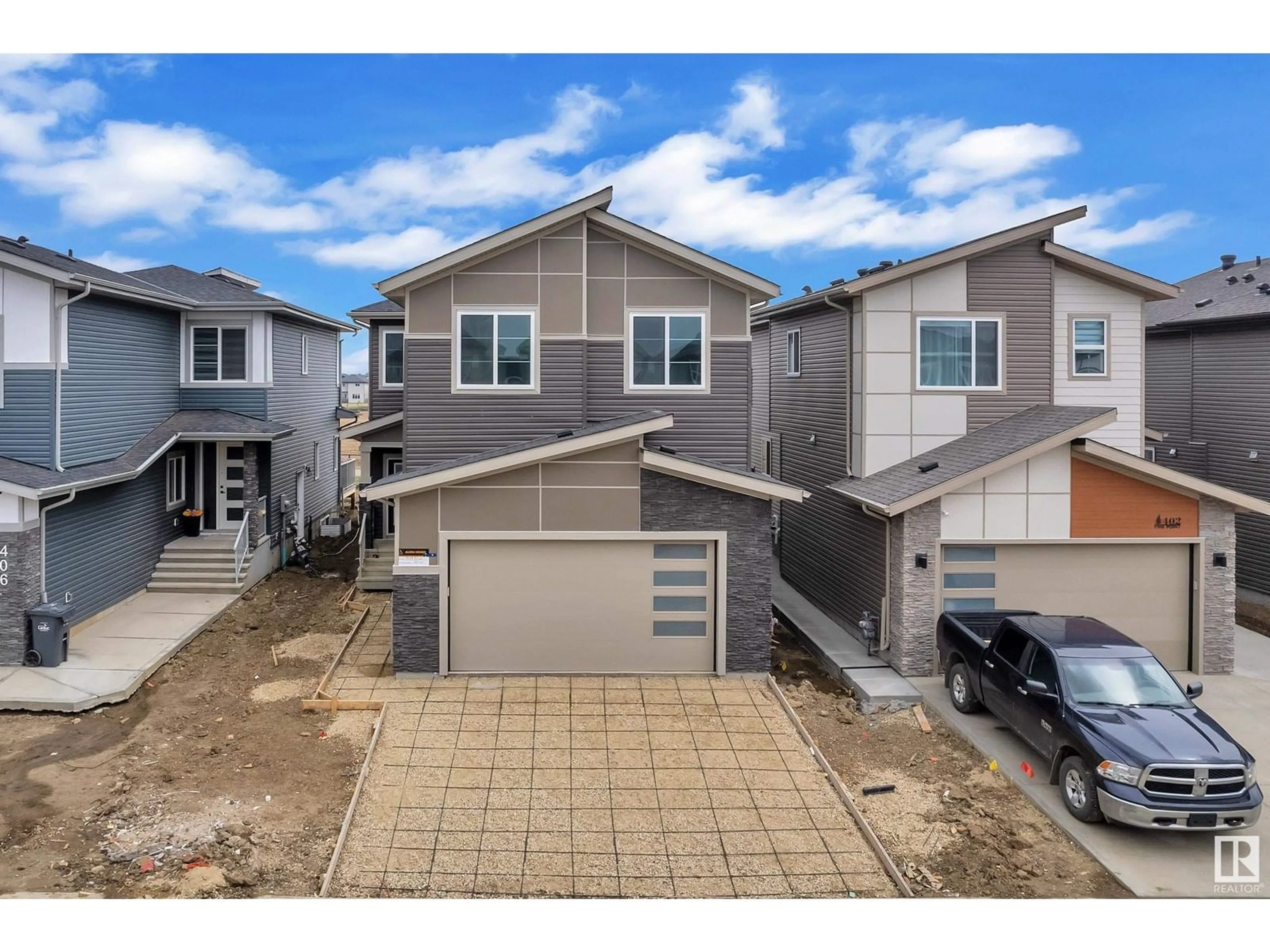 A pic from outside/outdoor area/front of a property/back of a property/a pic from drone, street for 404 PINE PT, Leduc Alberta T9E1S7