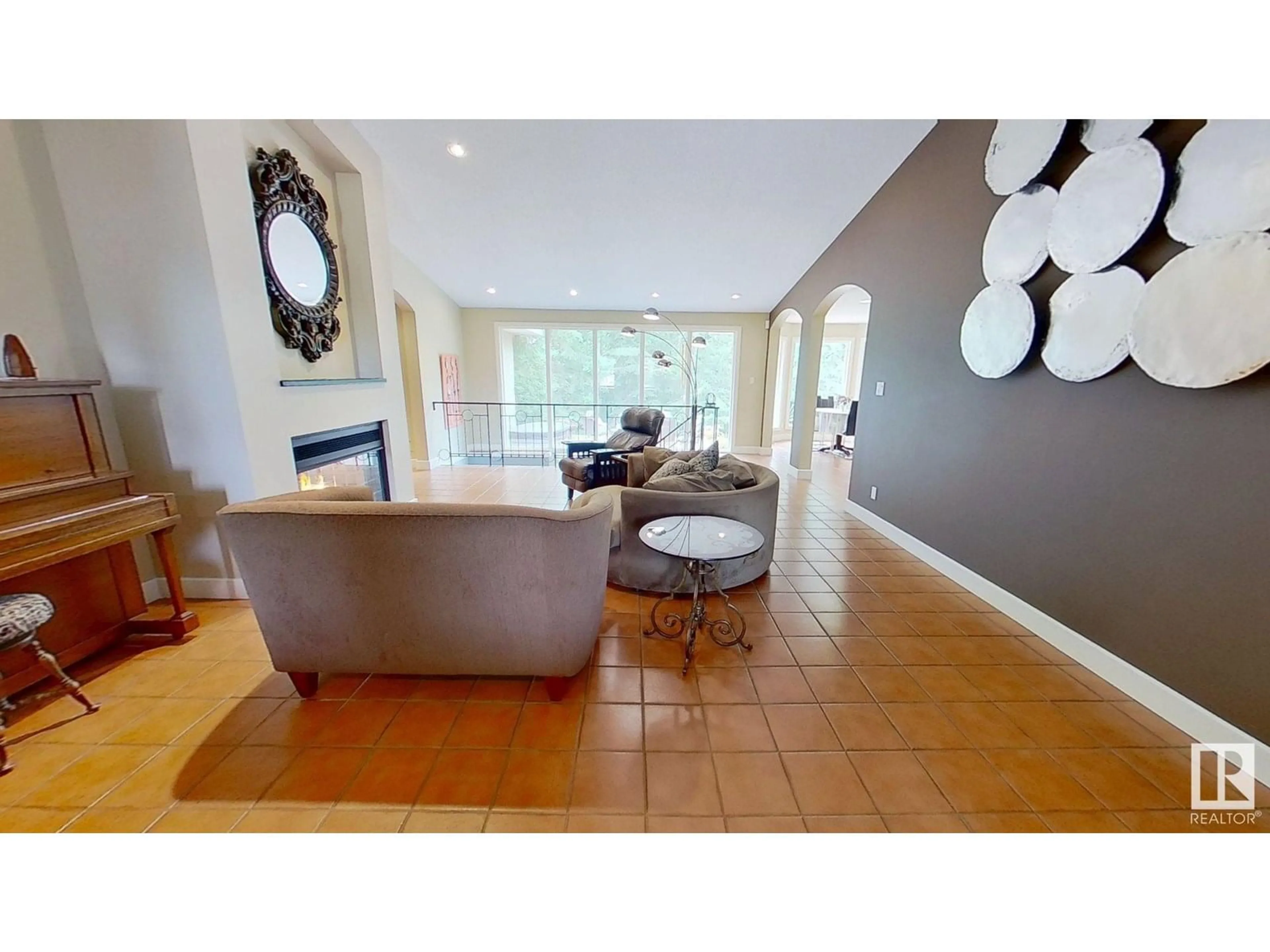 Living room with furniture, ceramic/tile floor for 129 RGE ROAD 261, Rural Parkland County Alberta T7Y1A3