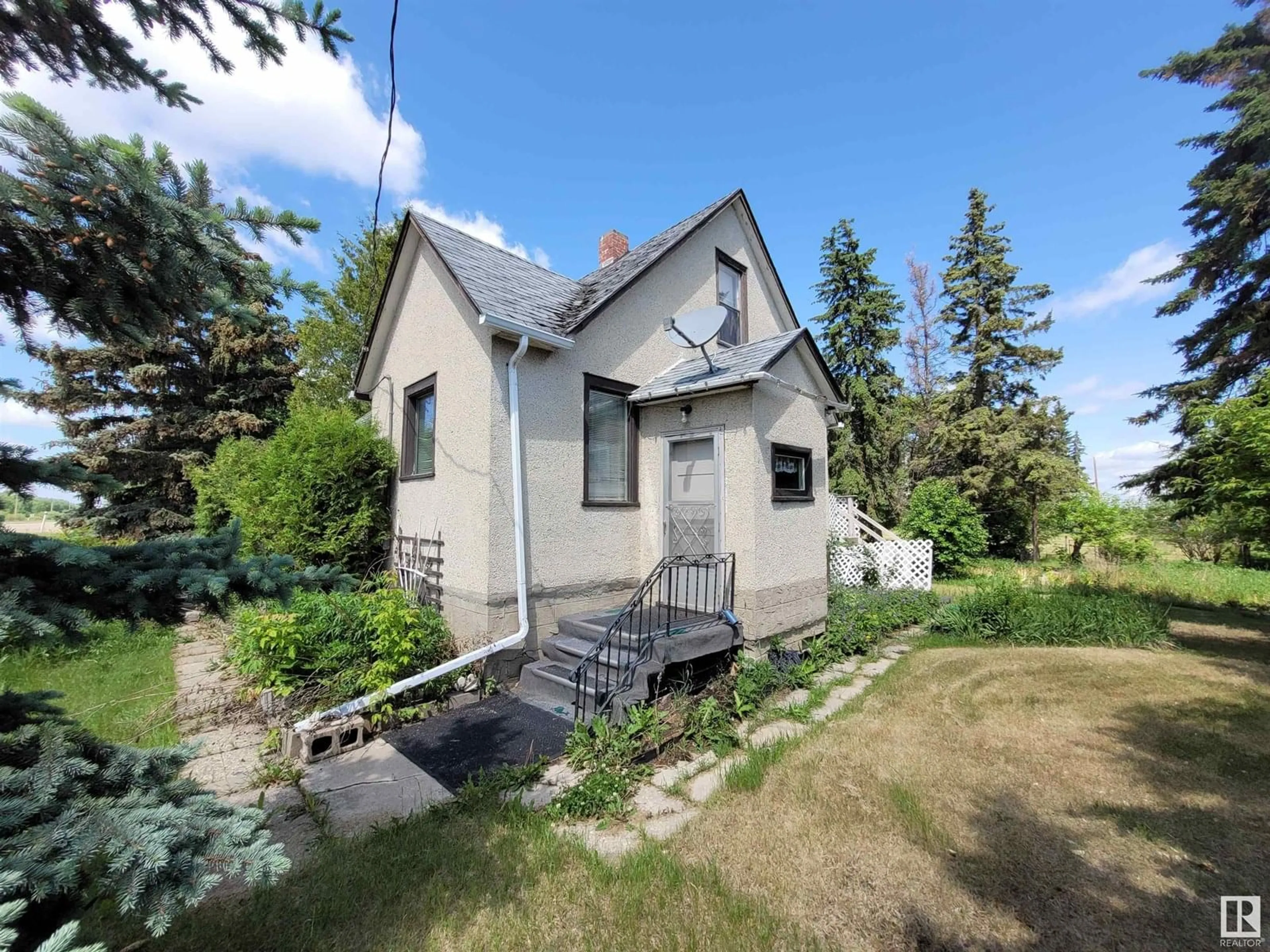 A pic from outside/outdoor area/front of a property/back of a property/a pic from drone, street for 22078 WYE RD, Rural Strathcona County Alberta T8E2G7