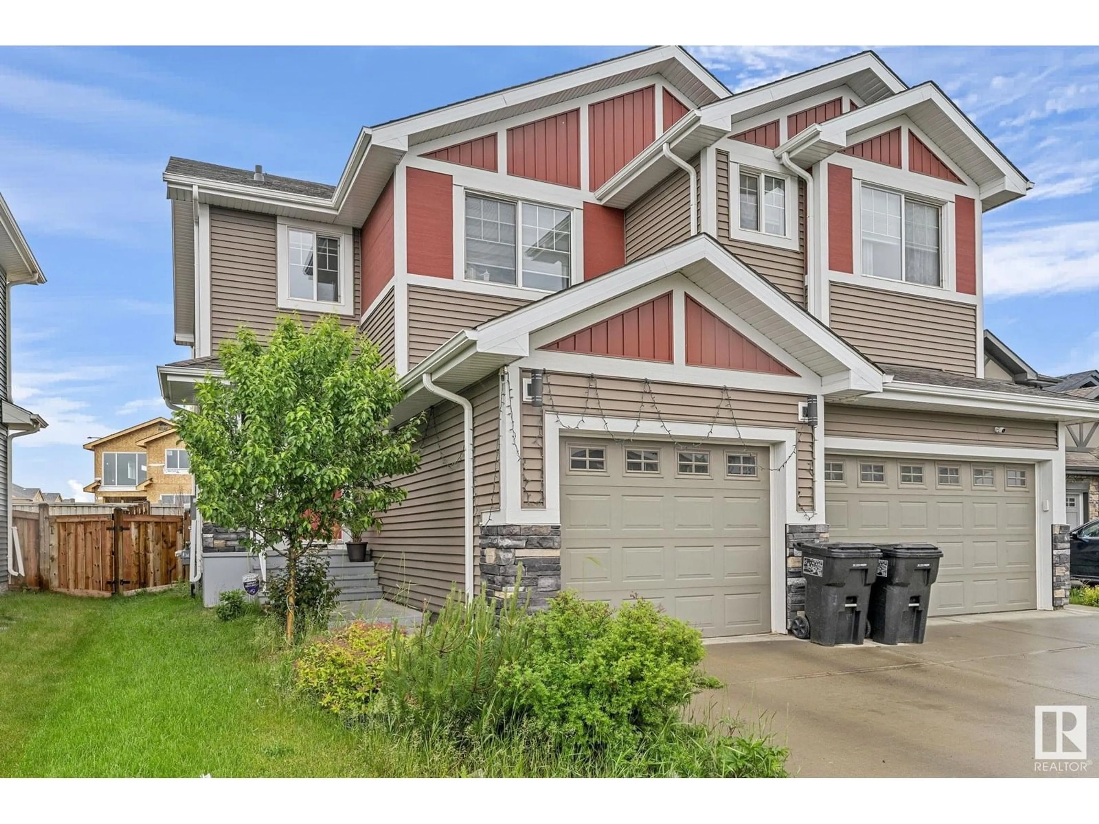 Home with vinyl exterior material, street for NW - 8812 223 ST, Edmonton Alberta T5T7H2