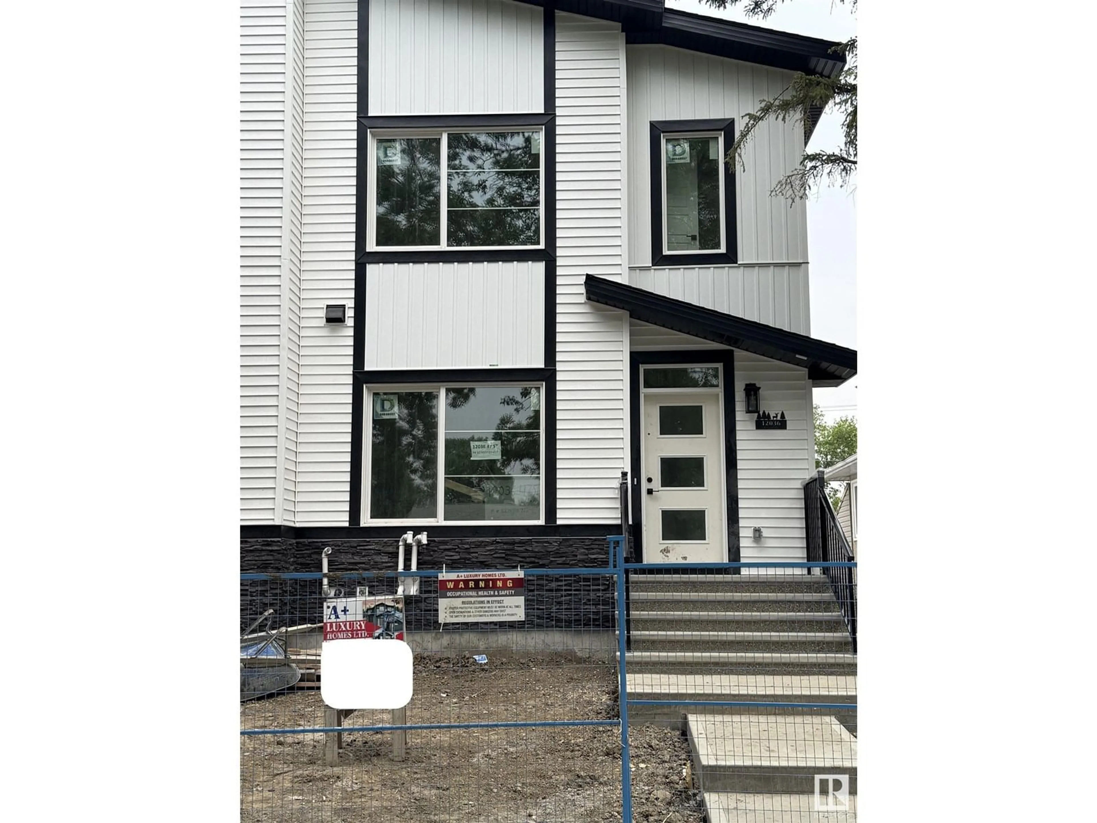 Home with vinyl exterior material, street for NW - 12036 47 ST, Edmonton Alberta T5W2X3
