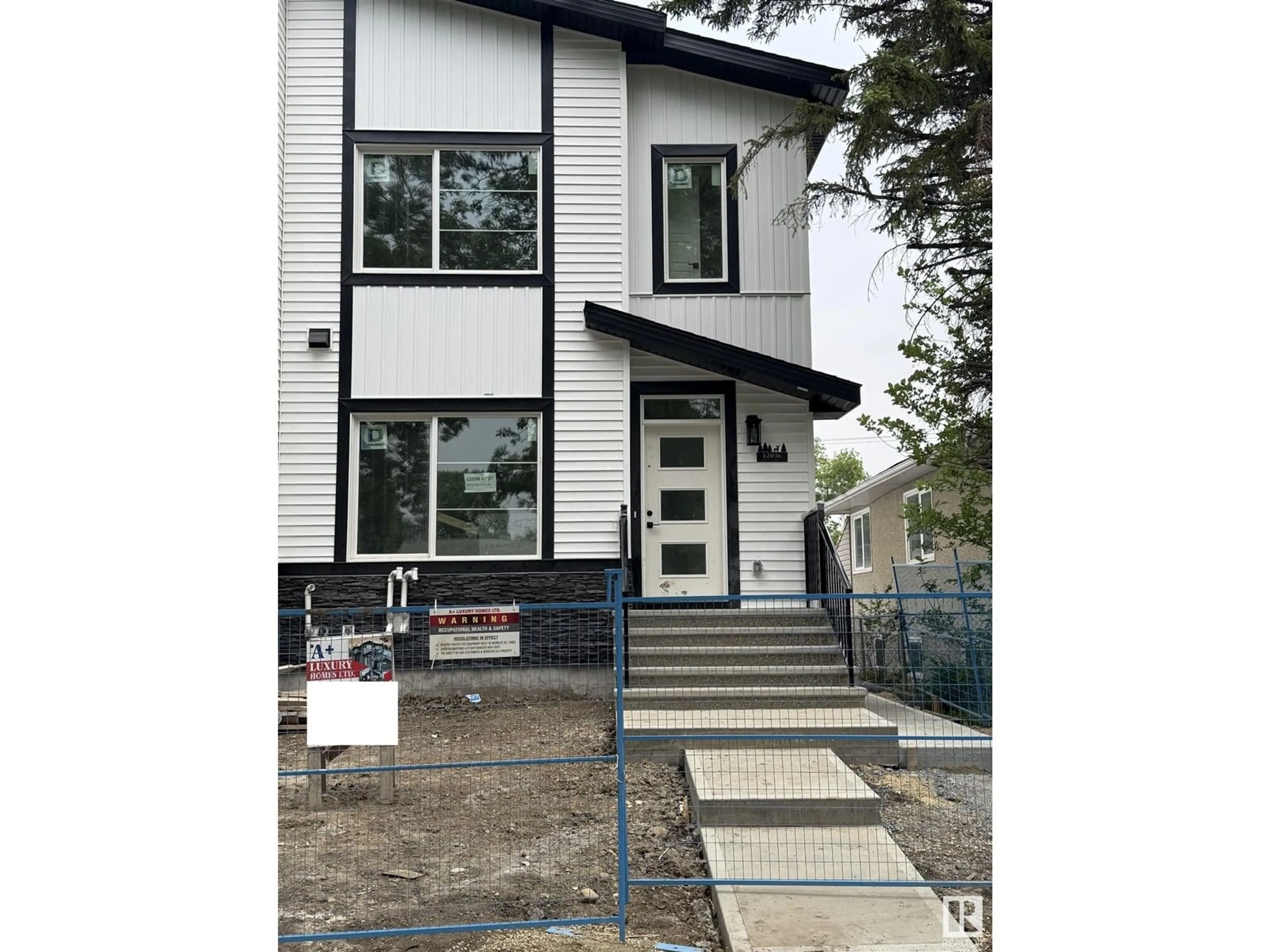 Home with vinyl exterior material, street for NW - 12036 47 ST, Edmonton Alberta T5W2X3